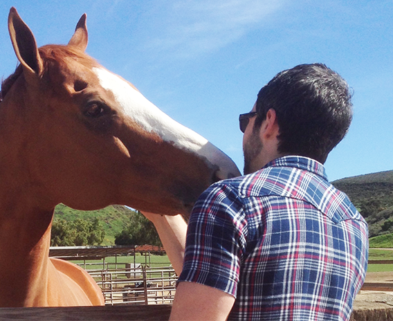 Composer Grant Fonda meeting the horses