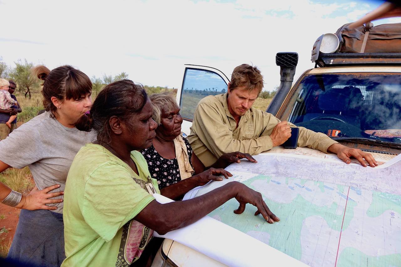 Land management requires far-ranging travel and navigation using local knowledge, maps and other media. Here, a trip to Lapi-lapi with traditional owners and AWC managers in 2016.