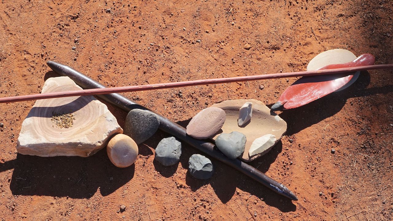 Sophisticated and multifunctional tools including basal grindstones and mortars, axe head, stone tools, spear and spear thrower belonging to Eastern Arrernte families. 