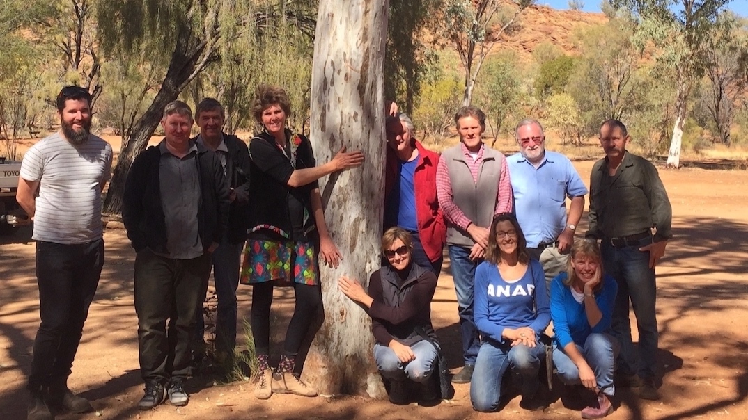 With a River red gum and Alice Springs locals - we met to discuss eucalypt ecology and practical actions to reduce loss of trees to fire, weeds and neglect (Olive Pink Botanic Garden 2018). 