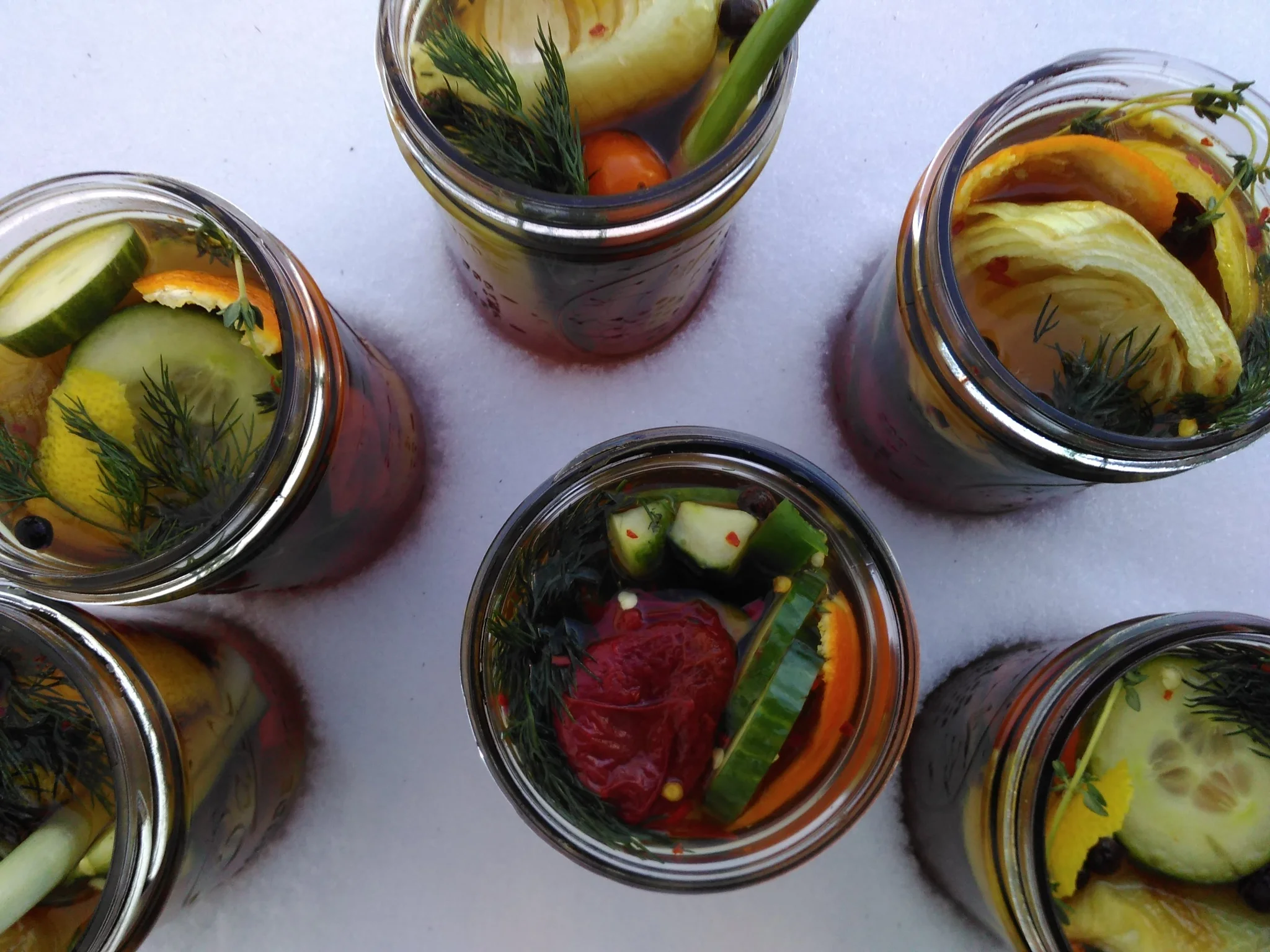 pickles w/ burst cherry tomatoes, charred sweet onion & orange zest