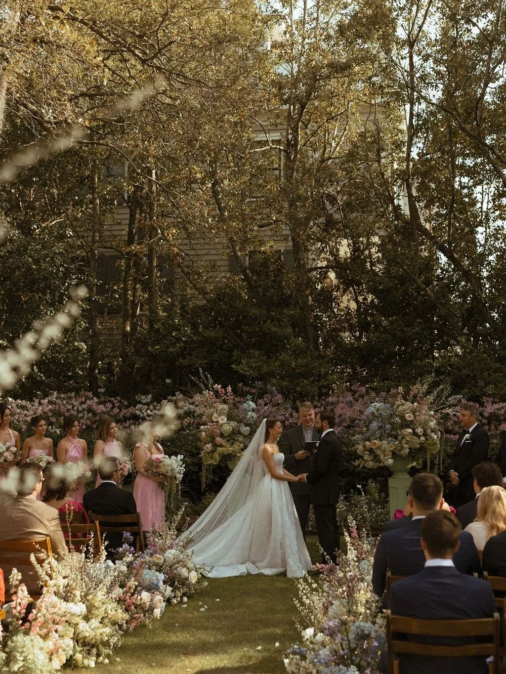 Spring season is officially in bloom- and the azaleas at @govthomasbennetthouse were working overtime for this beautiful ceremony!