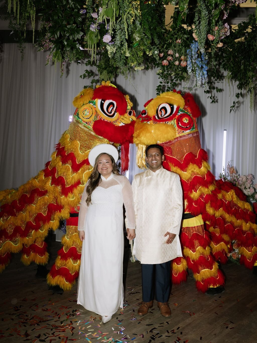 Honoring tradition, the lion dance offered a meaningful blessing of prosperity, good fortune, and new beginnings for My &amp; Jason as they began this next chapter together💛
.
.
.
Photo: @brooklyncphoto 
Video: @janayefilms 
Floral: @juniperjasmined