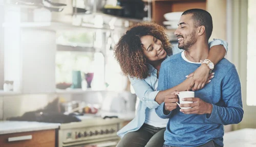 Couple relax in their clean home