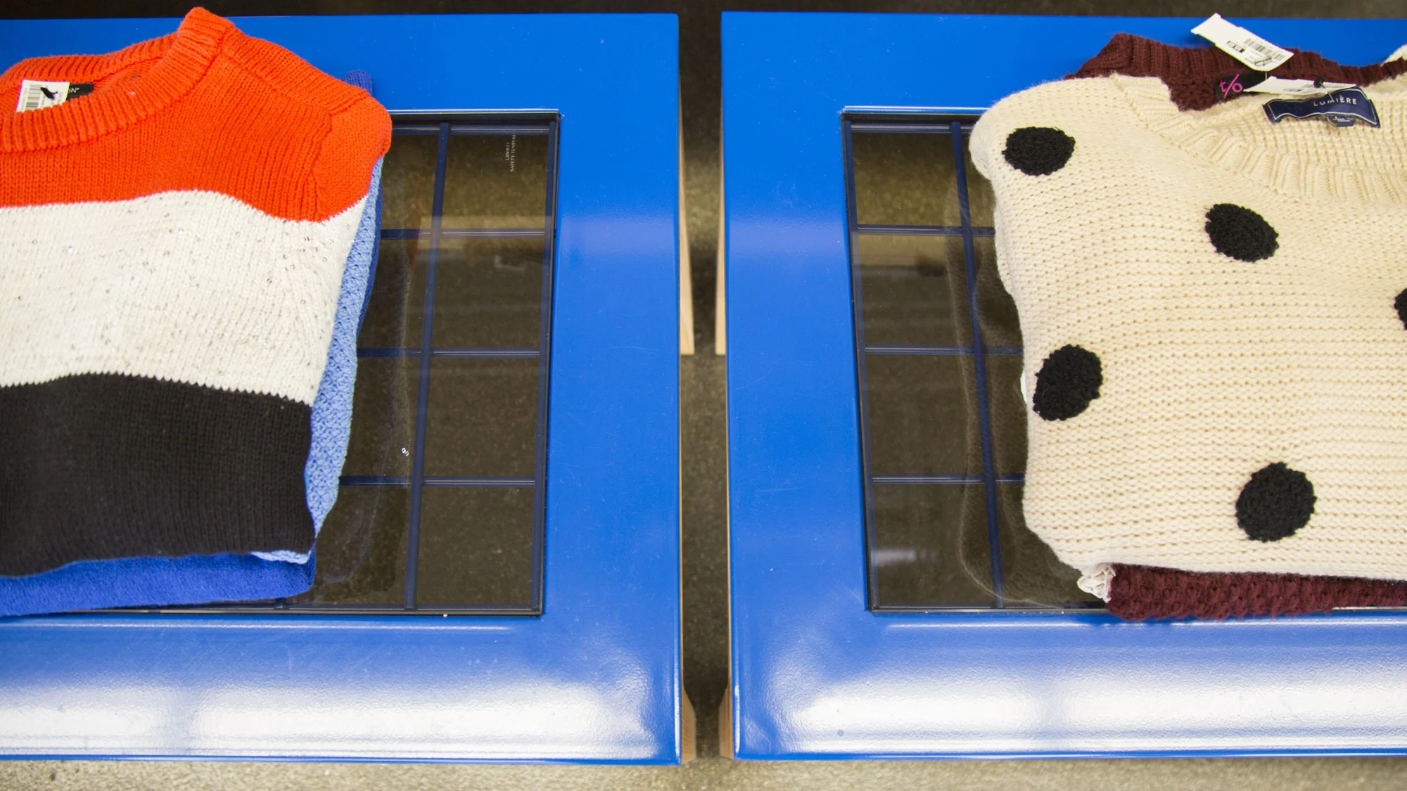 Blue metal retail tables