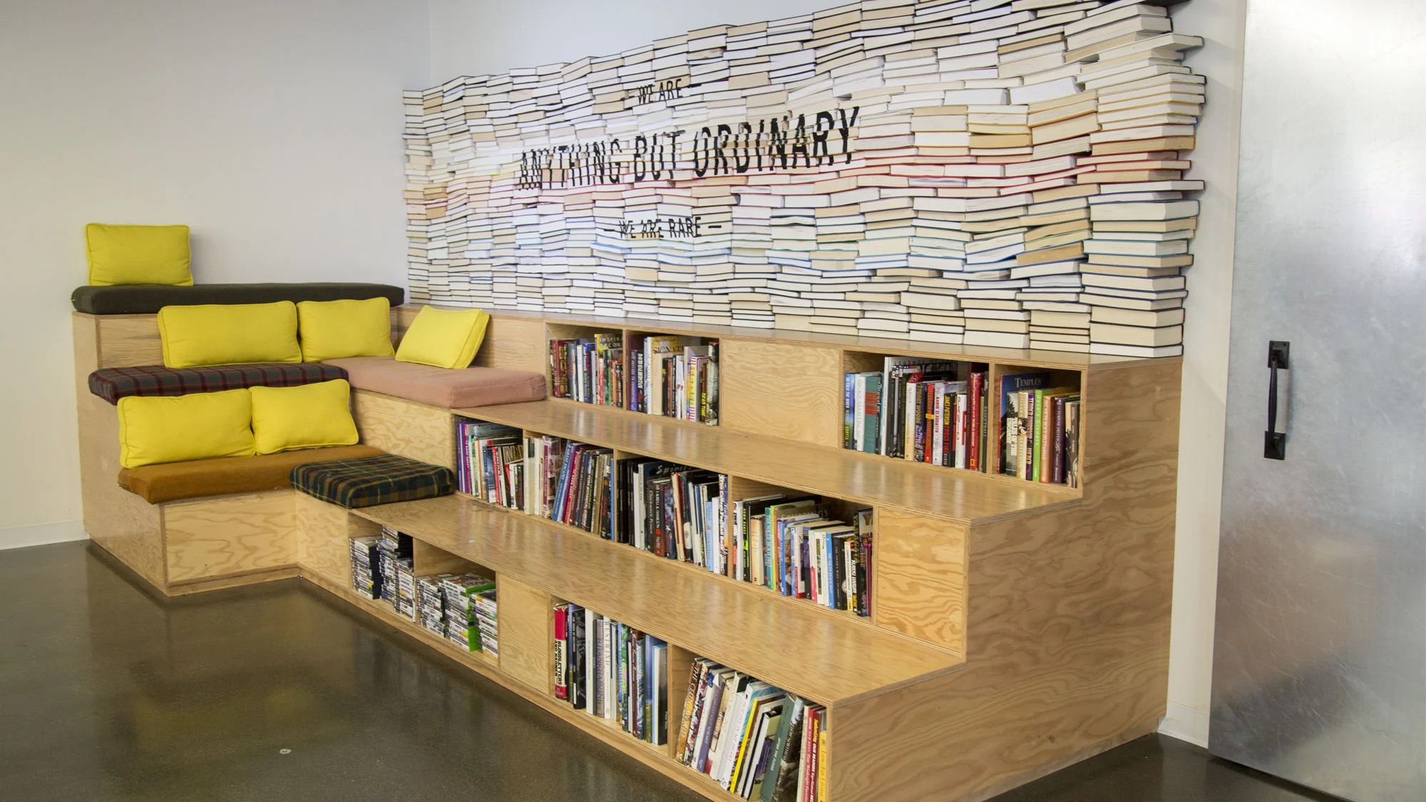 plywood book display for Rare by Goodwill