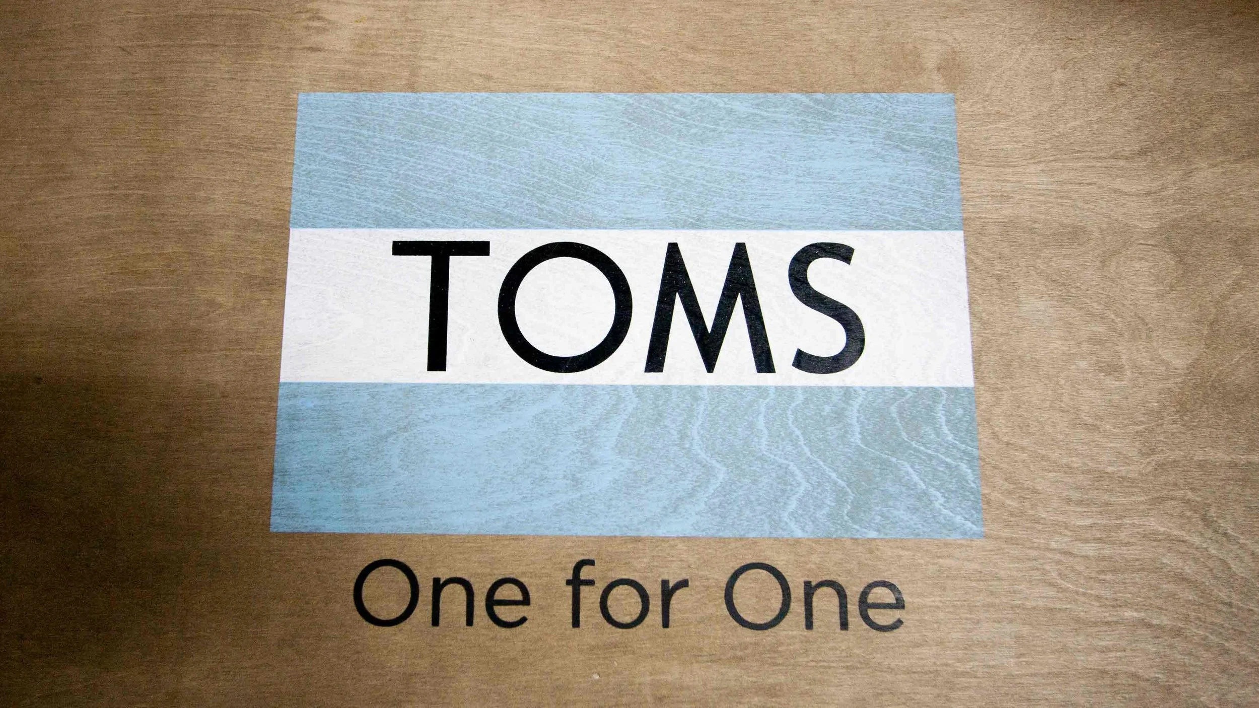 Toms shoes printed wood table
