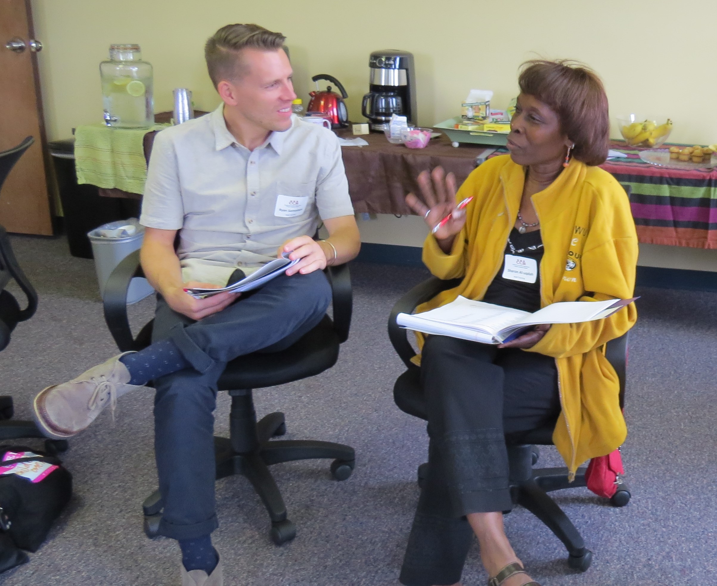 Two participants at an NAB workshop learn how to interact in ways that can de-escalate emotions that can lead to violence and to facilitate agreements between community members, a victim and an offender.