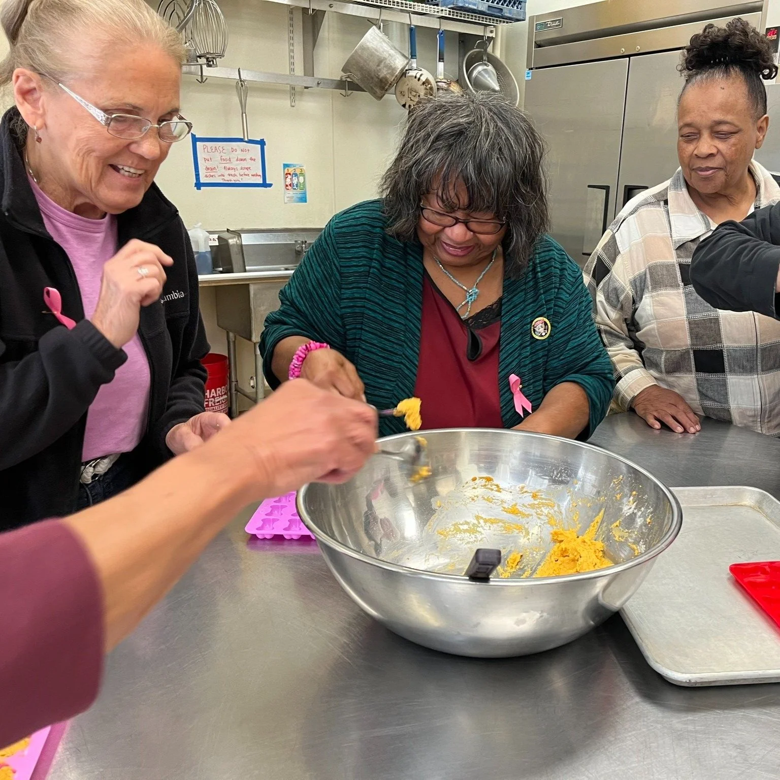 group of older adults baking together