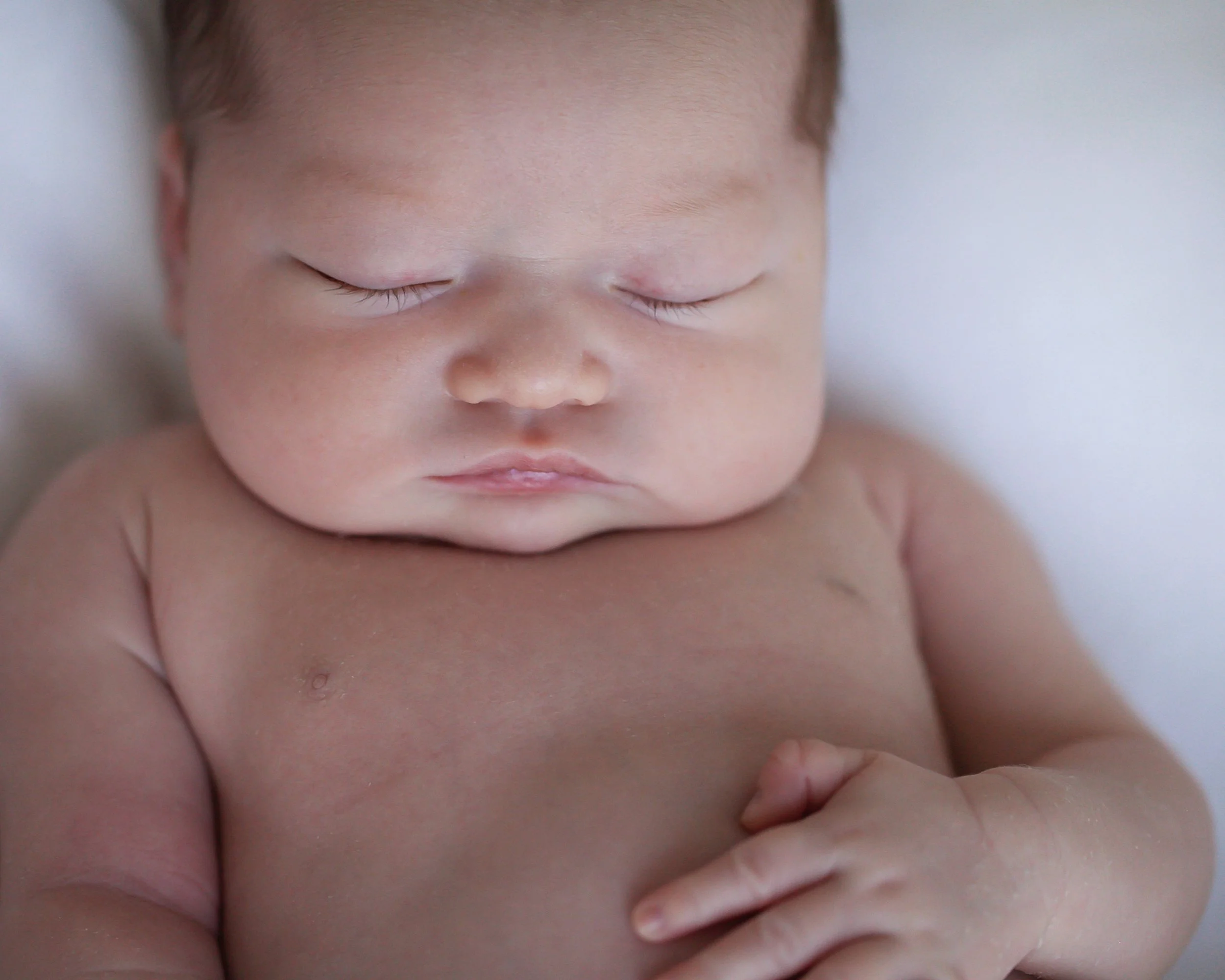 Should You Hire a Newborn Photographer? What Most Parents Don’t Realize