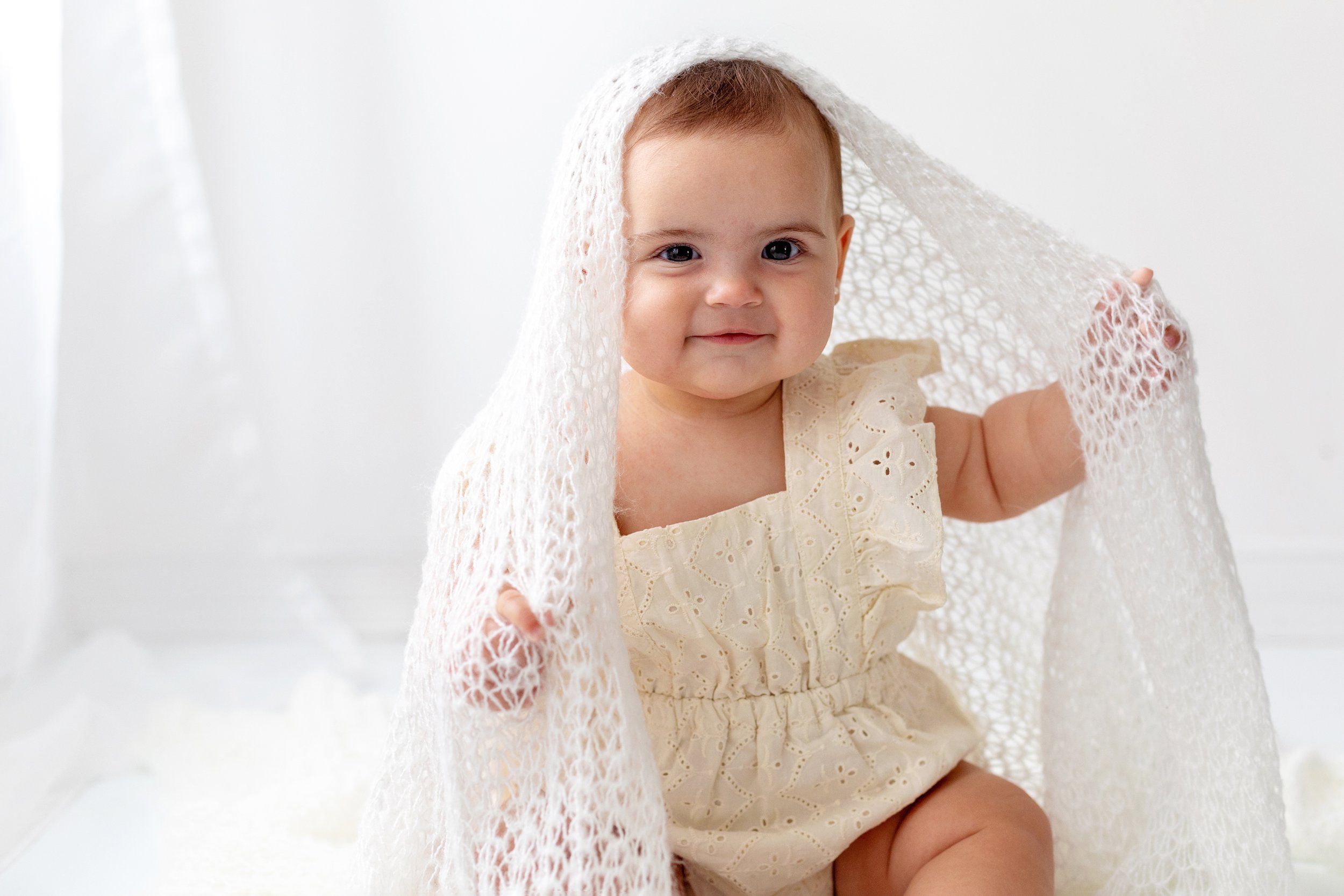 Smiling baby milestone session in Oshawa studio