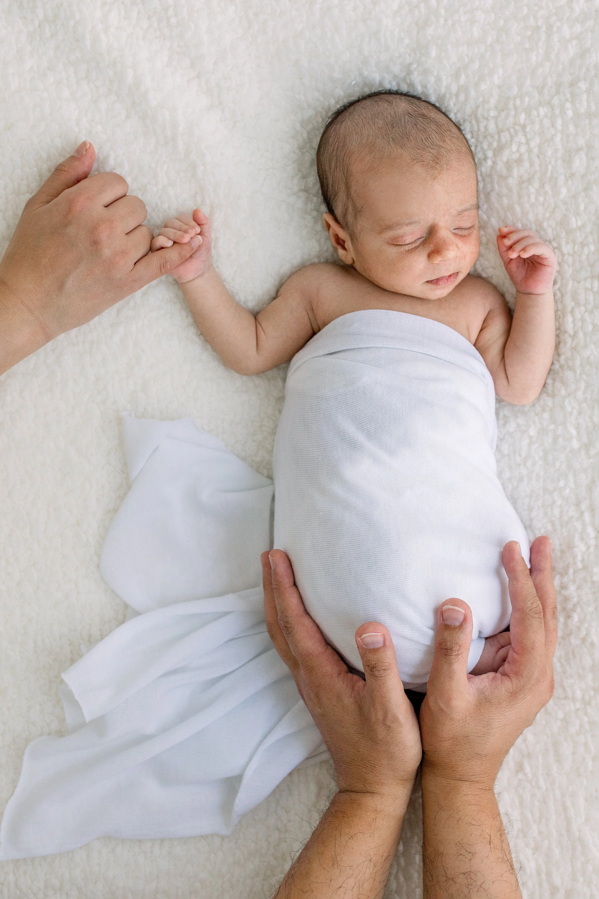 newborn baby wrapped white blanket Oshawa newborn photography