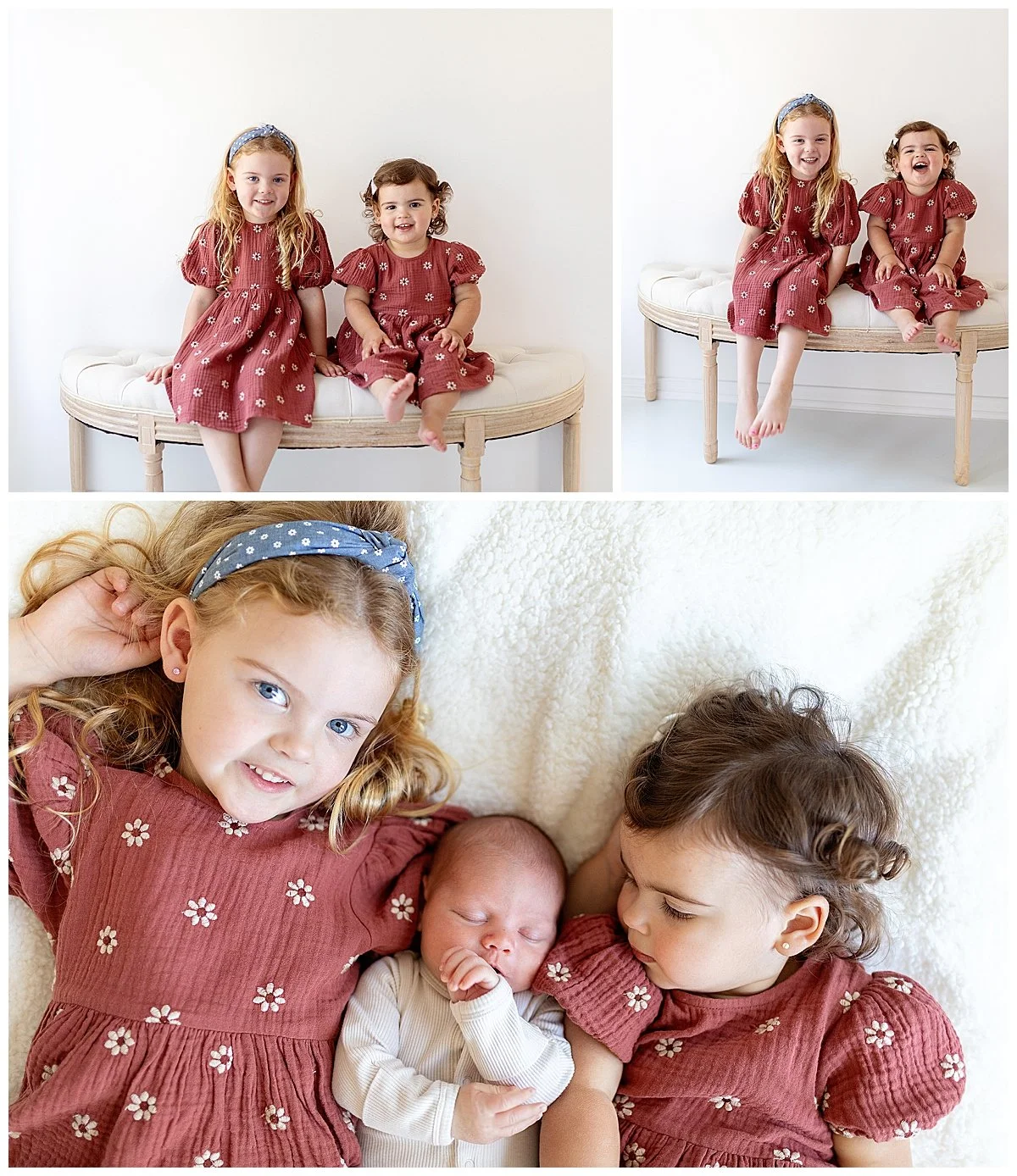 Toddler sisters in burgundy dresses smiling on a bench and laying down holding their newborn brother, in Oshawa