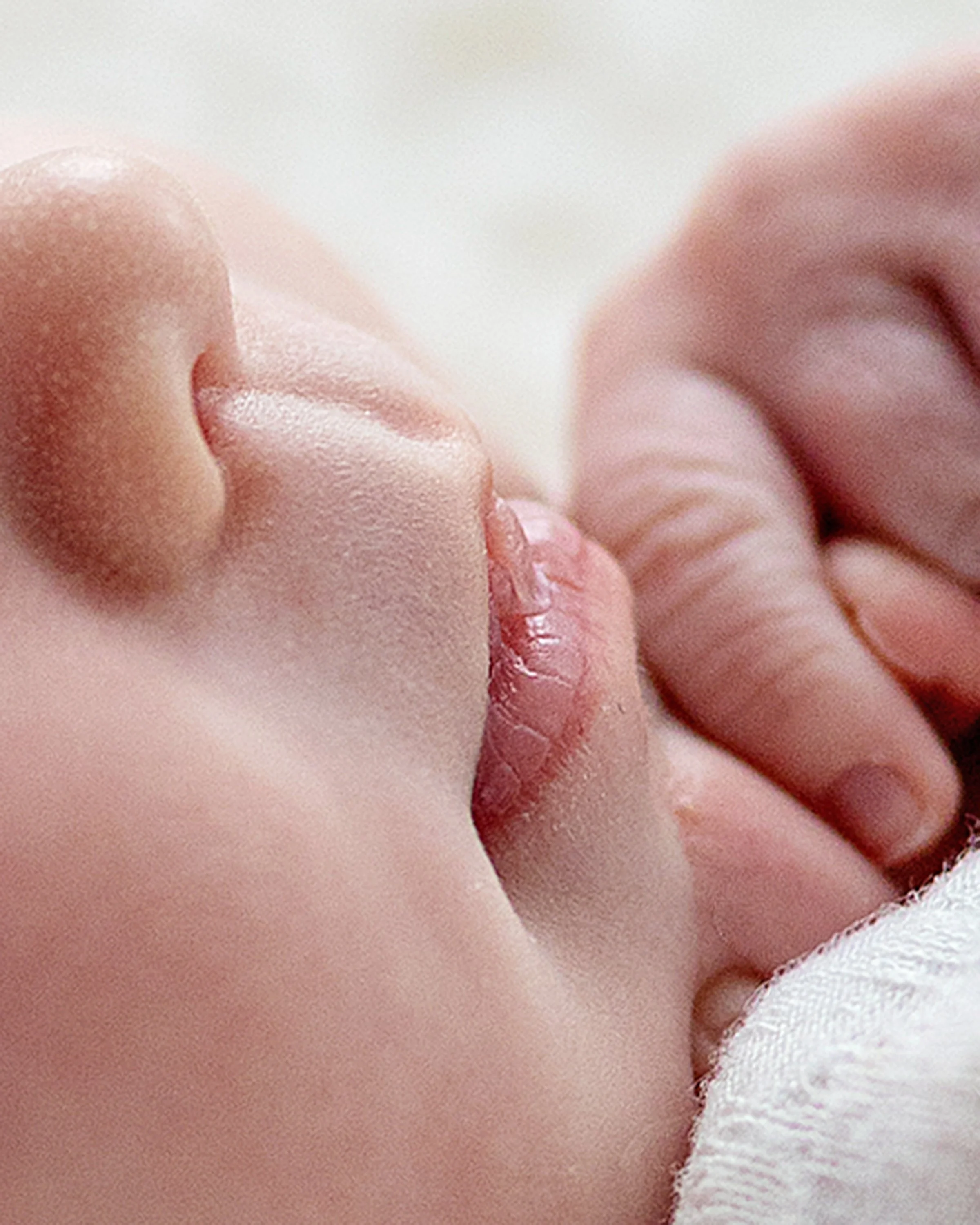 Detail close up of baby nose and lips during newborn studio session in Oshawa, Durham Region