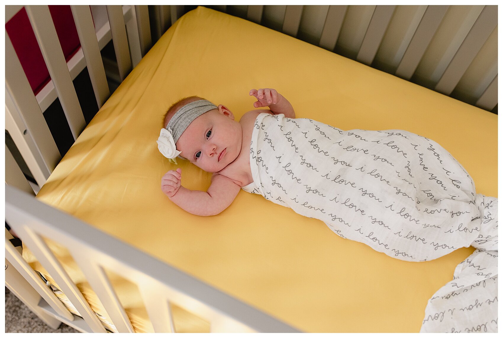 Newborn Baby Girl in Crib