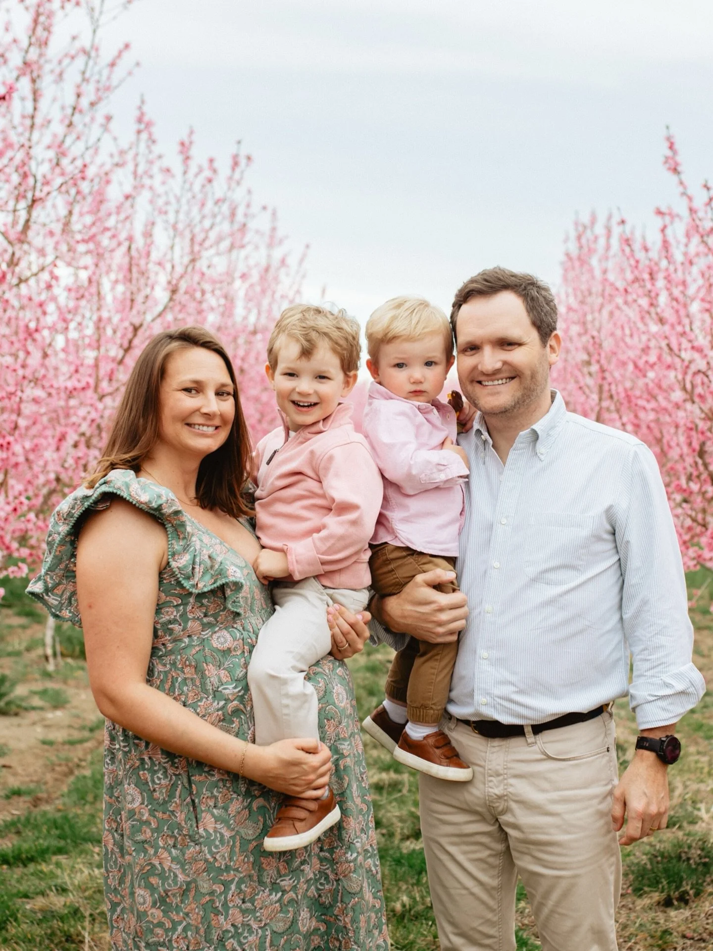 Let this be your sign to book your spring photoshoot! I love seeing everything around the valley waking up. Thank you @cherryhillfarms.idaho for having us for this gorgeous maternity shoot. Your peach trees were popping! Their cherry trees bloom next