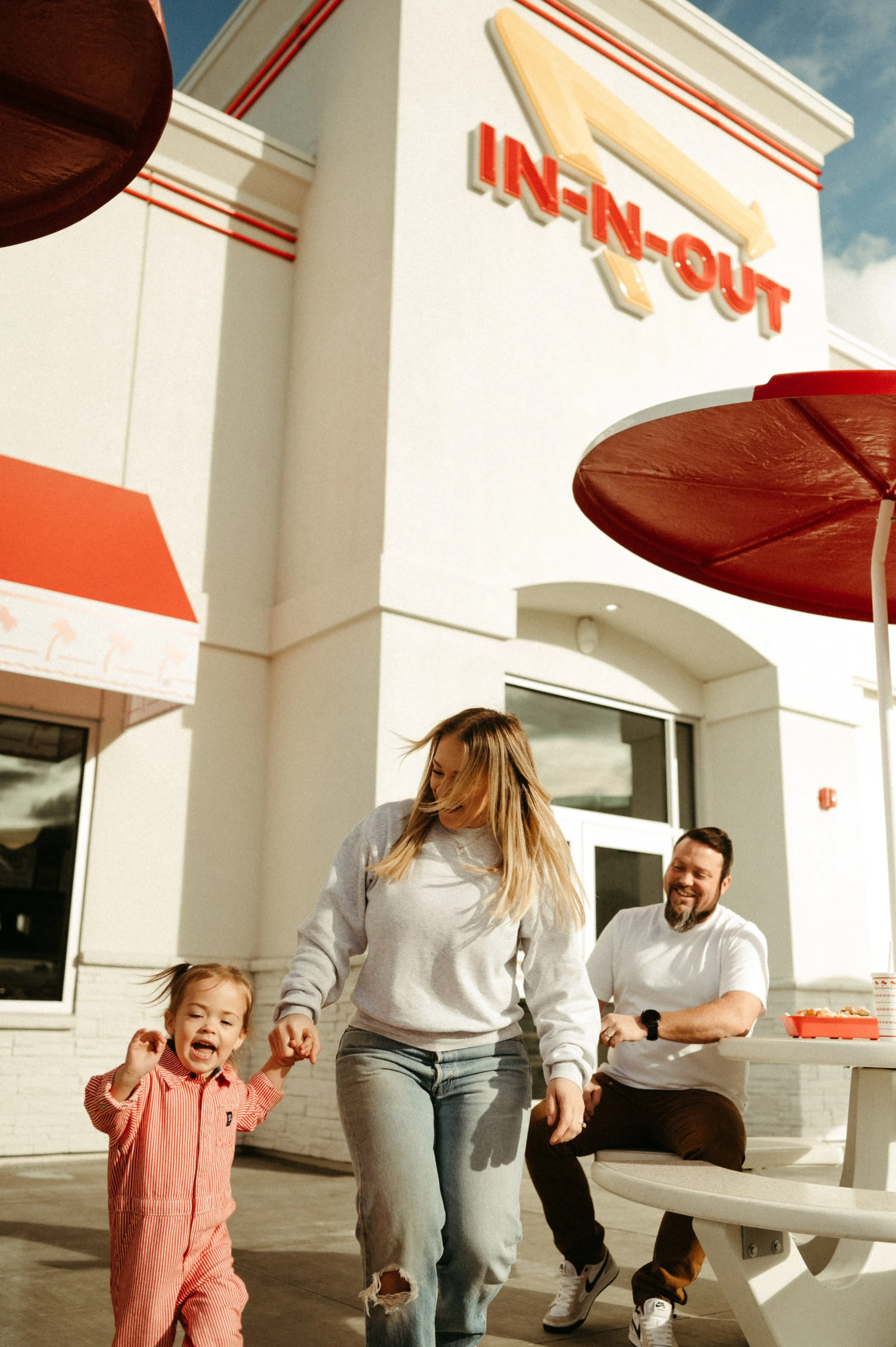 Family outside of in-in-out burger