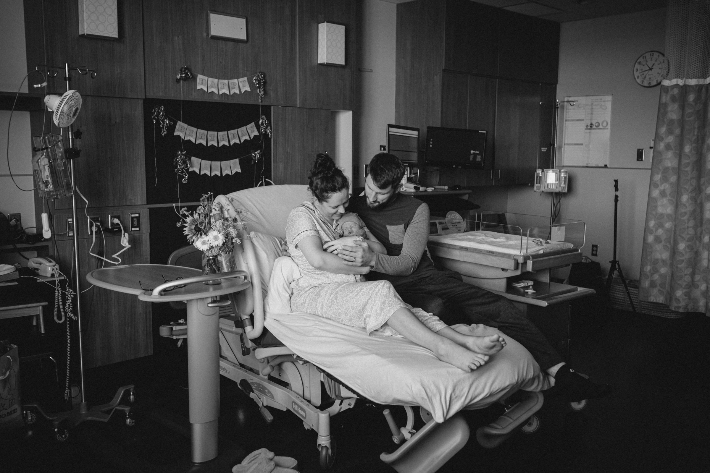 Parents look at baby in hospital room in Nampa Idaho