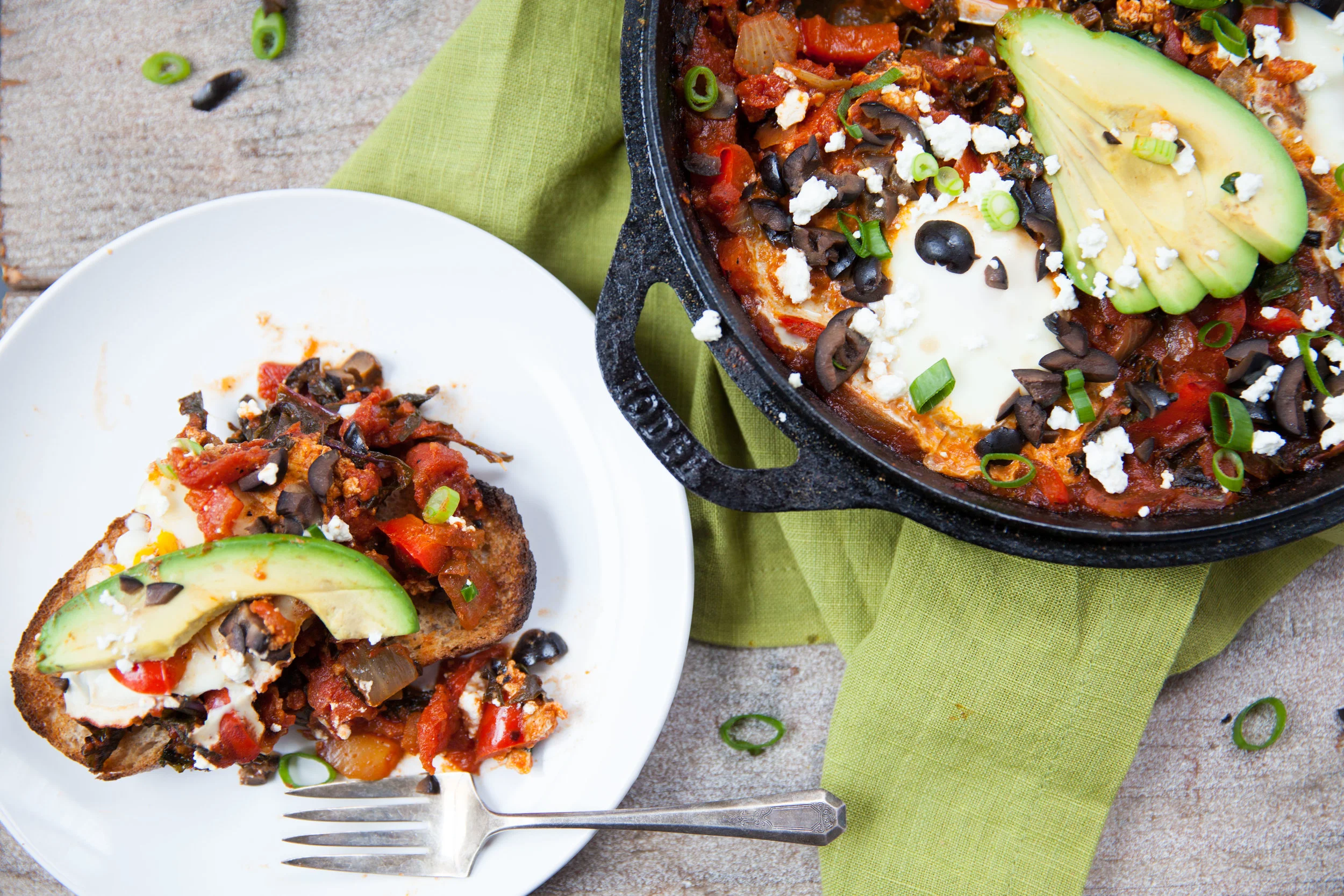 Shakshuka with Avocado, Olives, and Feta 