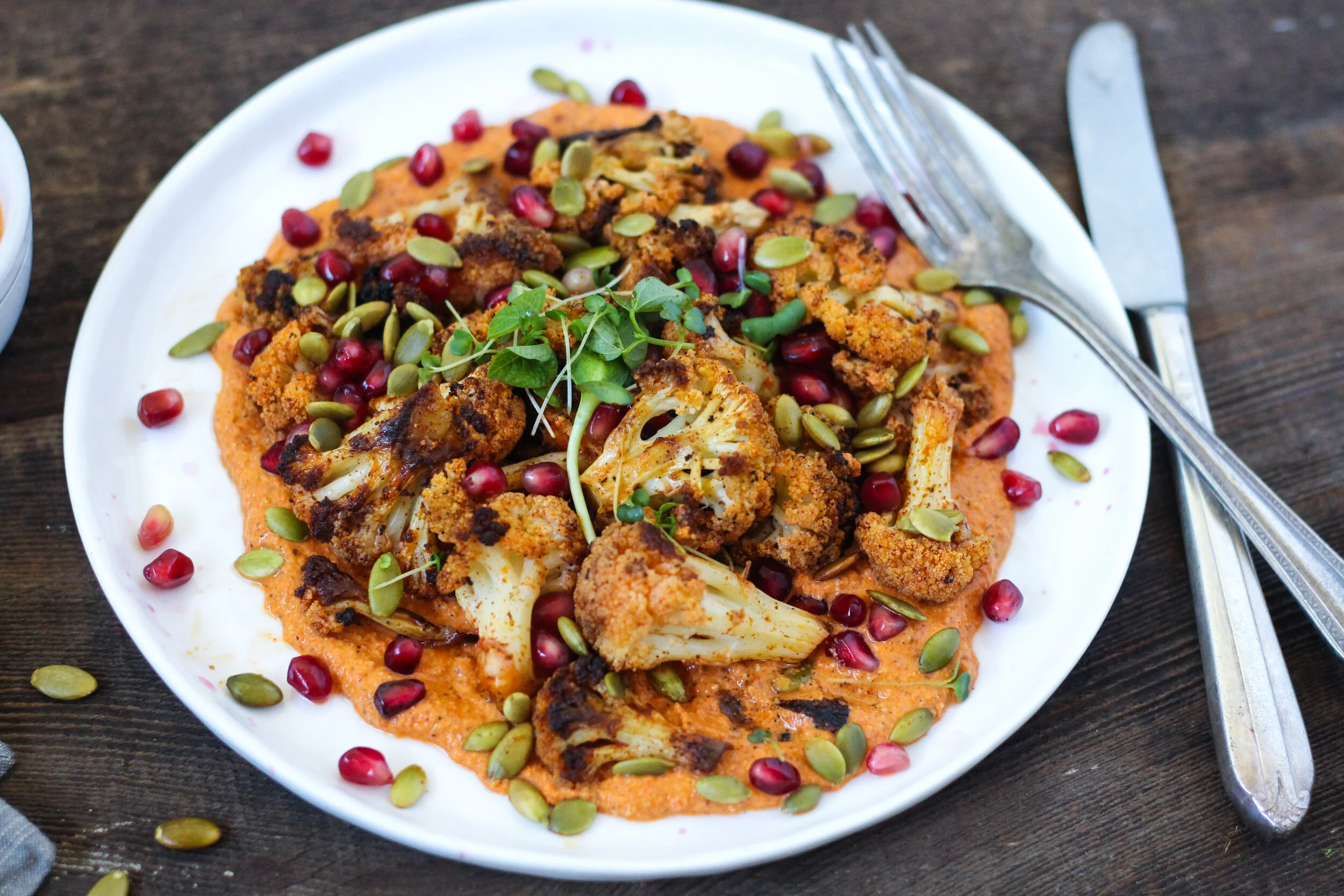 Roasted Cauliflower with Romesco and Pomegranate