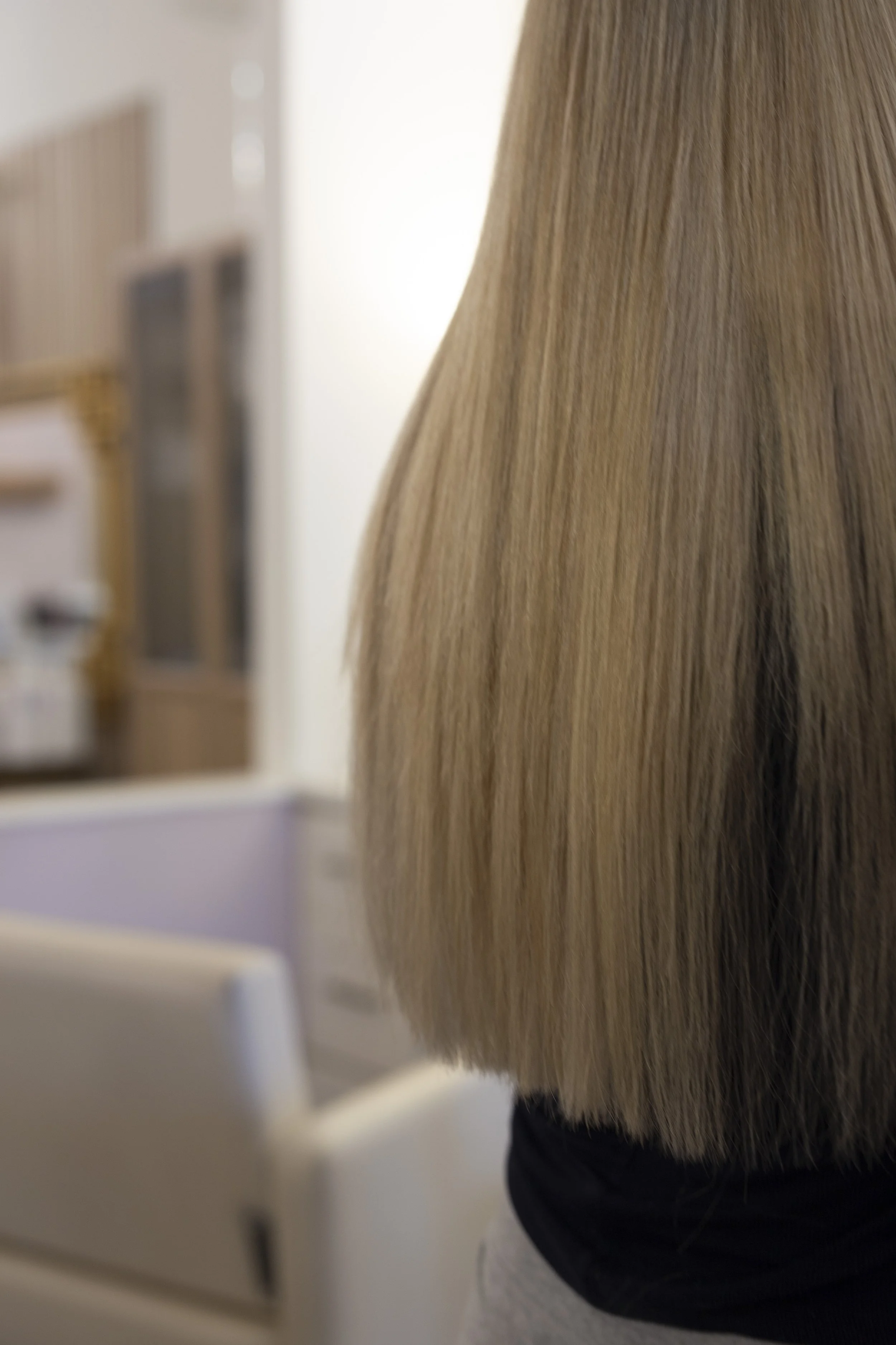 Healthy, trimmed hair ends after a Davines treatment at Alchemy Park Style Bar