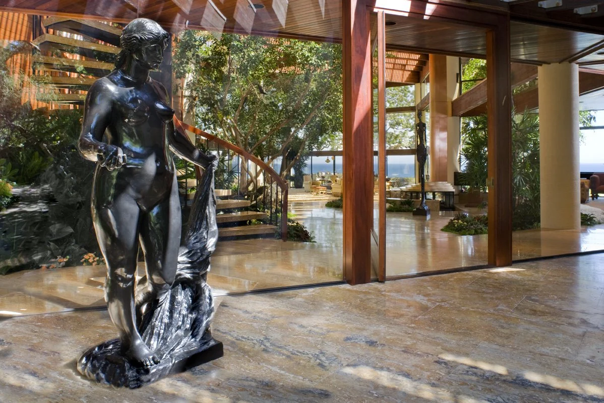 Malibu Entry Vignette with Renoir and Giacometti sculpture by SUBU Design Architecture