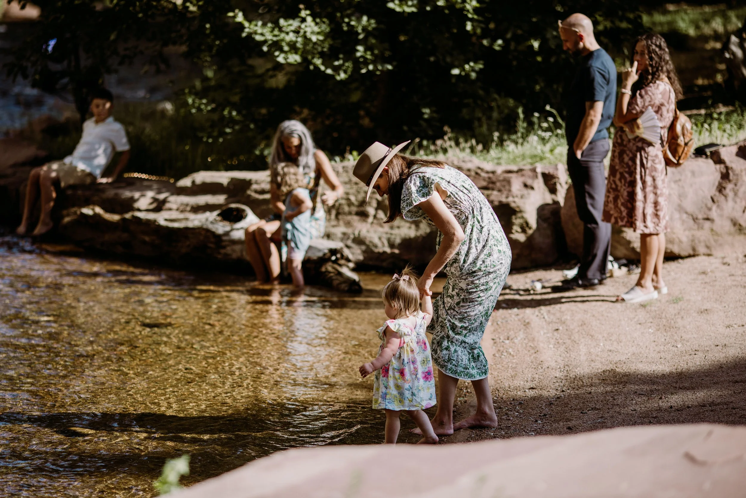 tayler carlisle wedding guests river.jpg