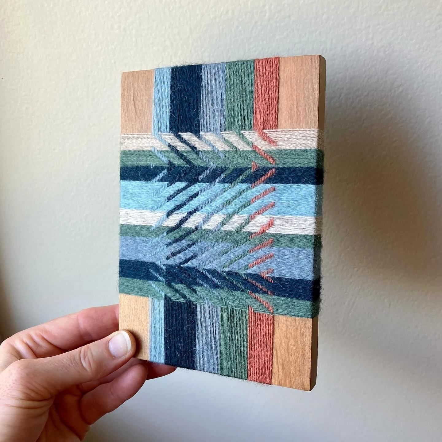 &ldquo;Sea glass II&rdquo;, 11cm x 16cm, wool and reclaimed rimu. $40 plus postage. DM if you&rsquo;re interested ✨All profits go to an Aotearoa women&rsquo;s charity.

Still inspired by the greens and blues of sea glass with this weaving. I love t