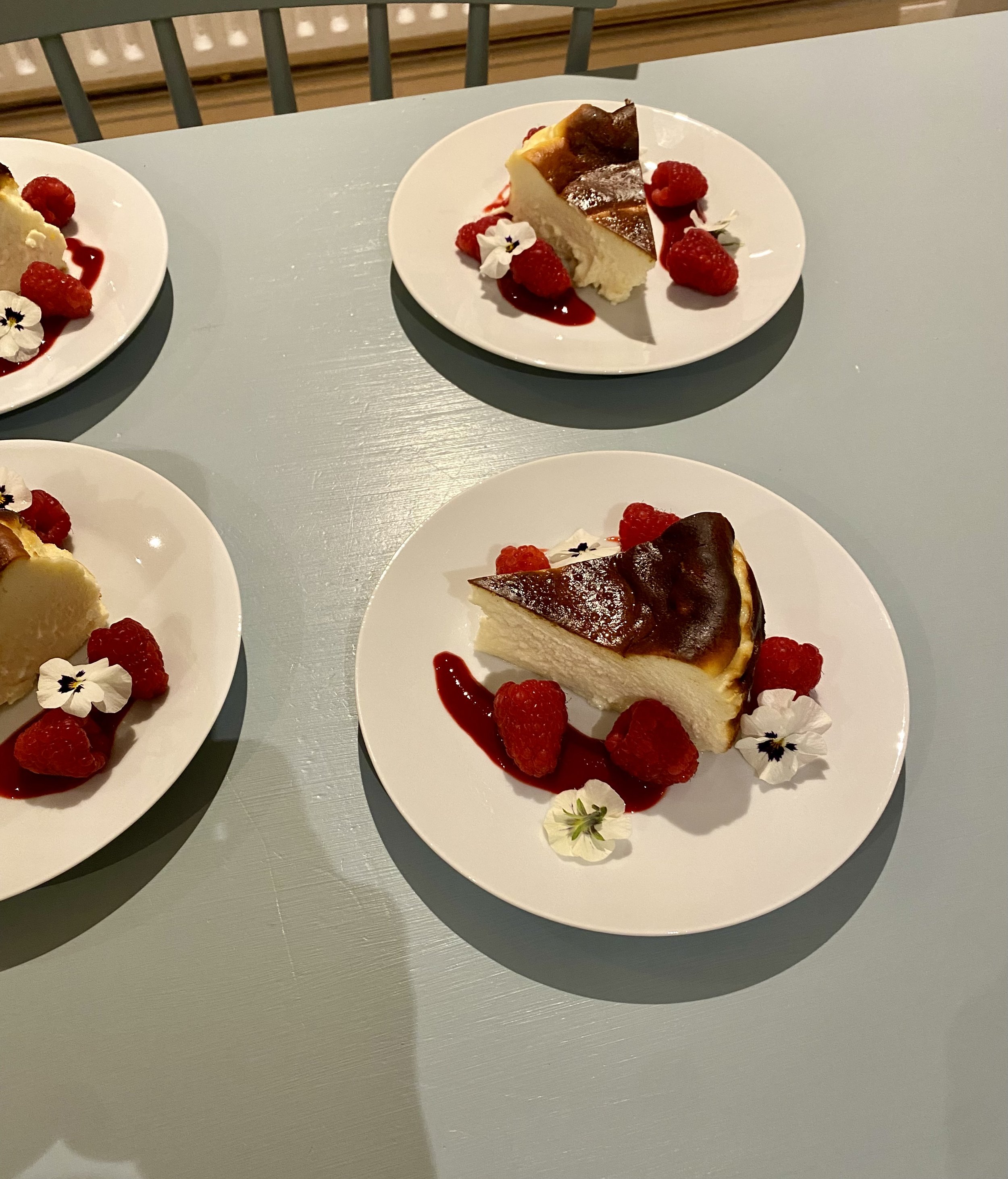 Burnt Basque Cheesecake, Raspberry Coulis, Raspberries