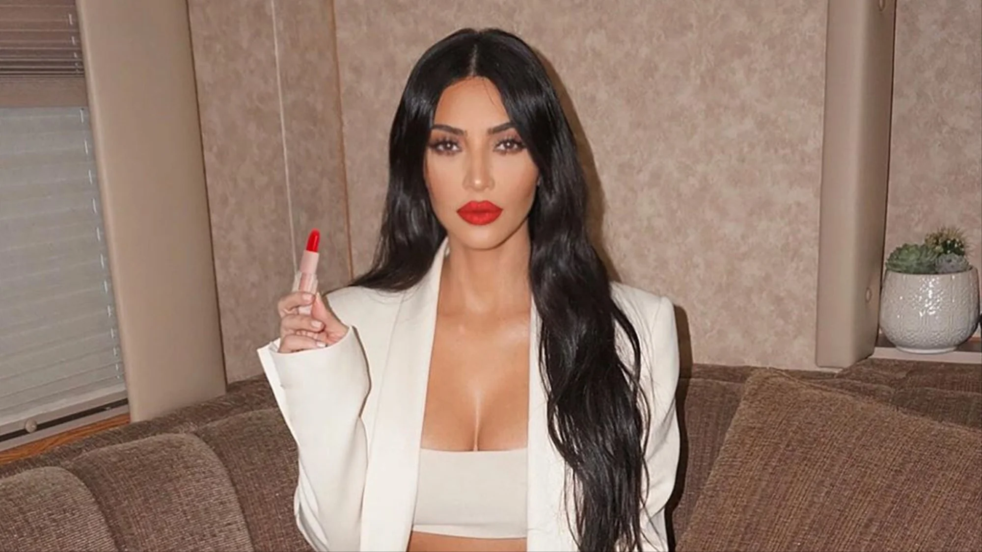 1550067174763-kim-kardashian-smooth-skin-lede.jpg