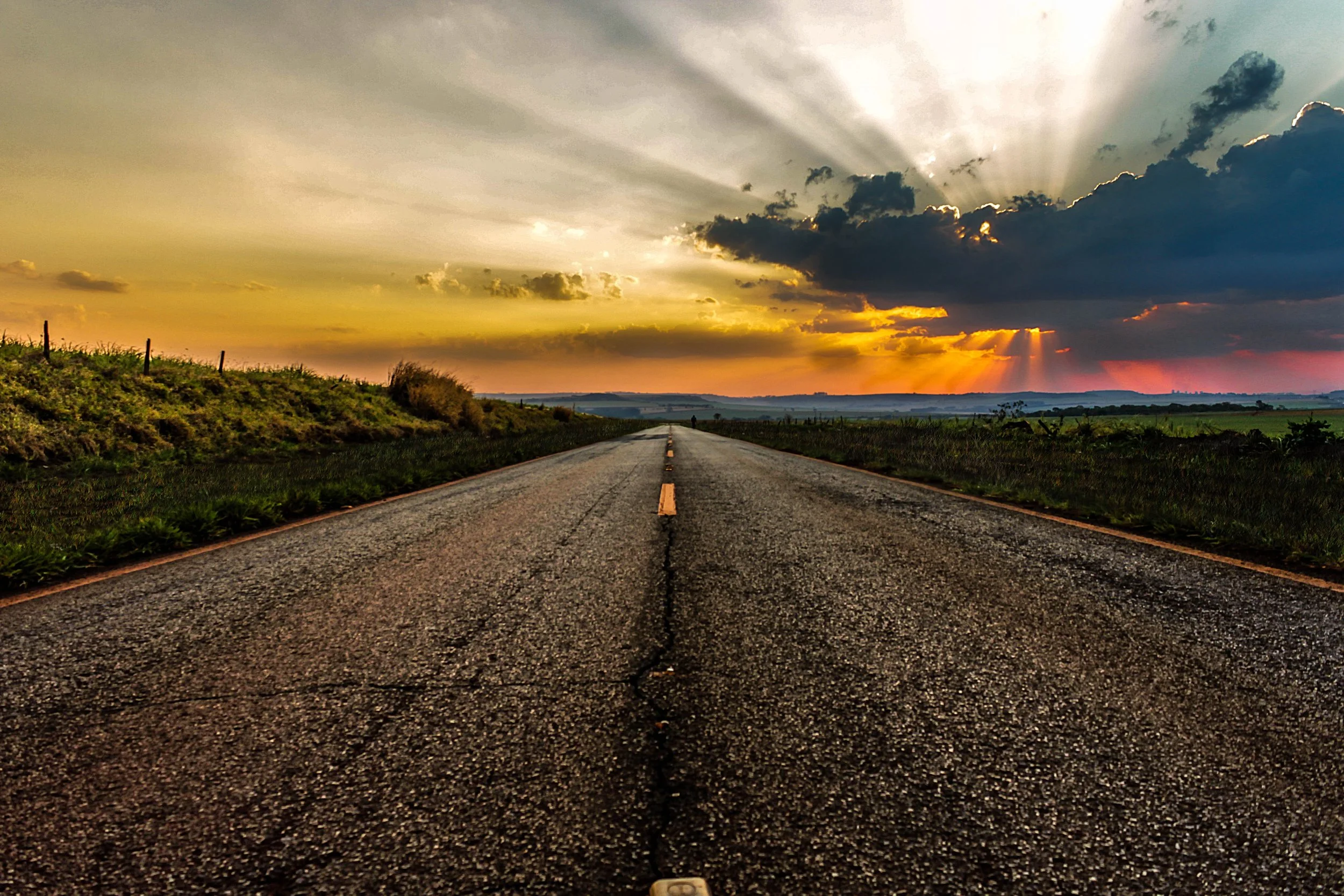 asphalt-clouds-countryside-672597.jpg