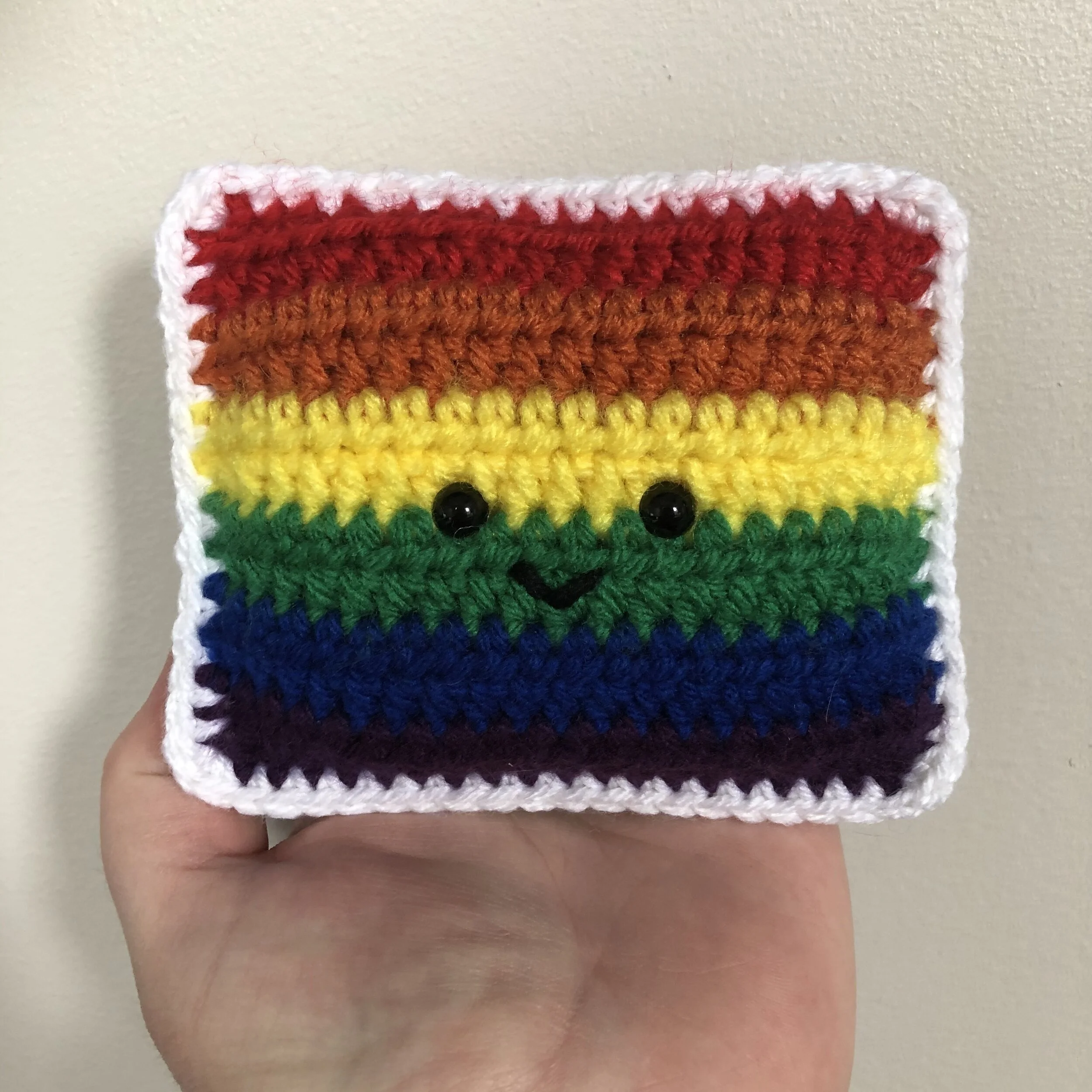 Crocheted Rainbow Flag Amigurumi