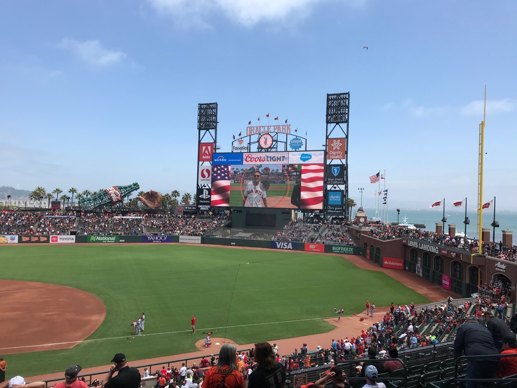 Kenny Loggins (scoreboard) singing National Anthem