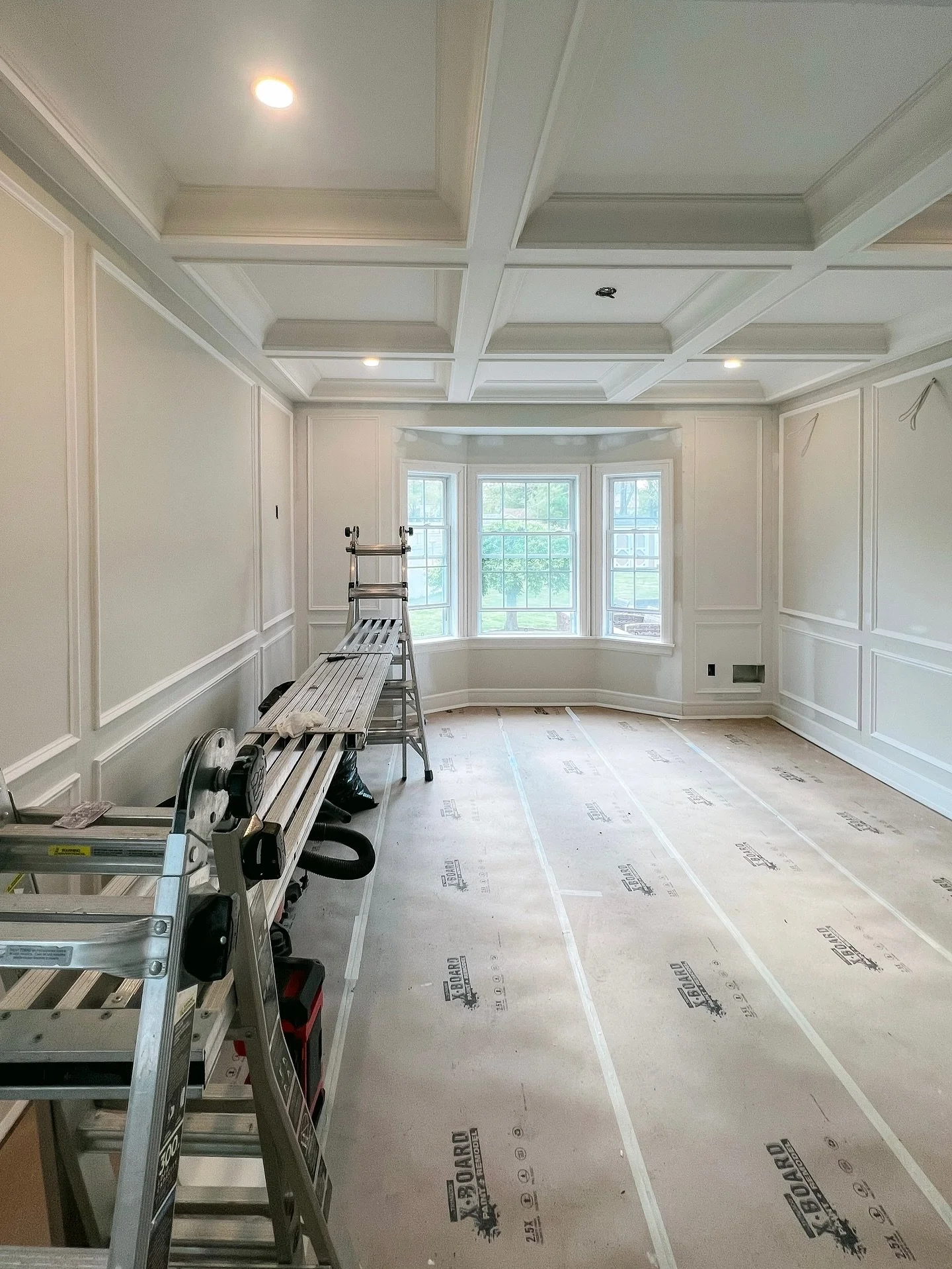 Progress pics.  Coffered ceiling, picture frame molding, and new columns.