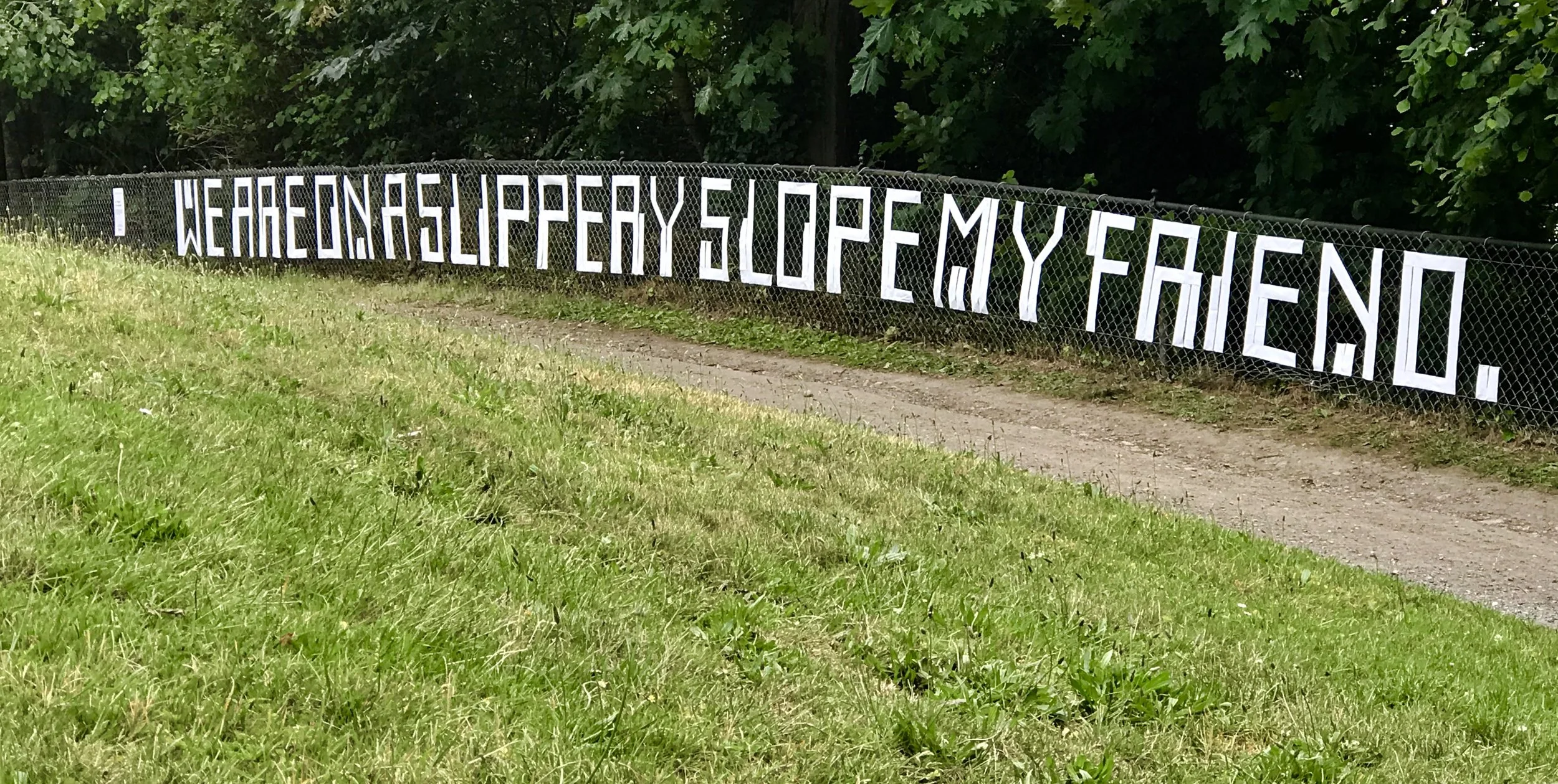   Slippery , 2018. Recycled vinyl from promotional banners. 36 x 60 feet. 