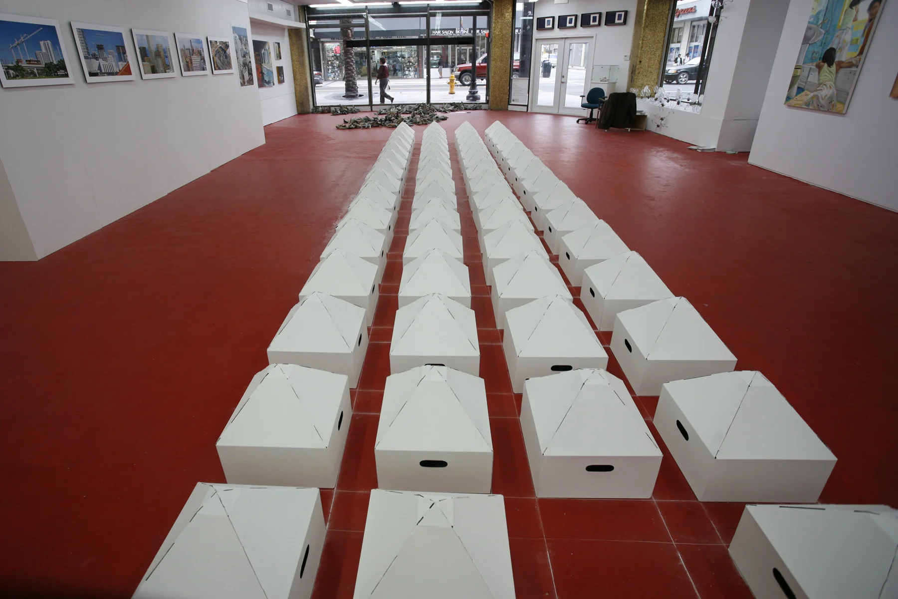   Rigid Set of 59’ , 2007. Painted manufactured 16 x 16 x 16 inch cardboard boxes. Dimensions variable. 