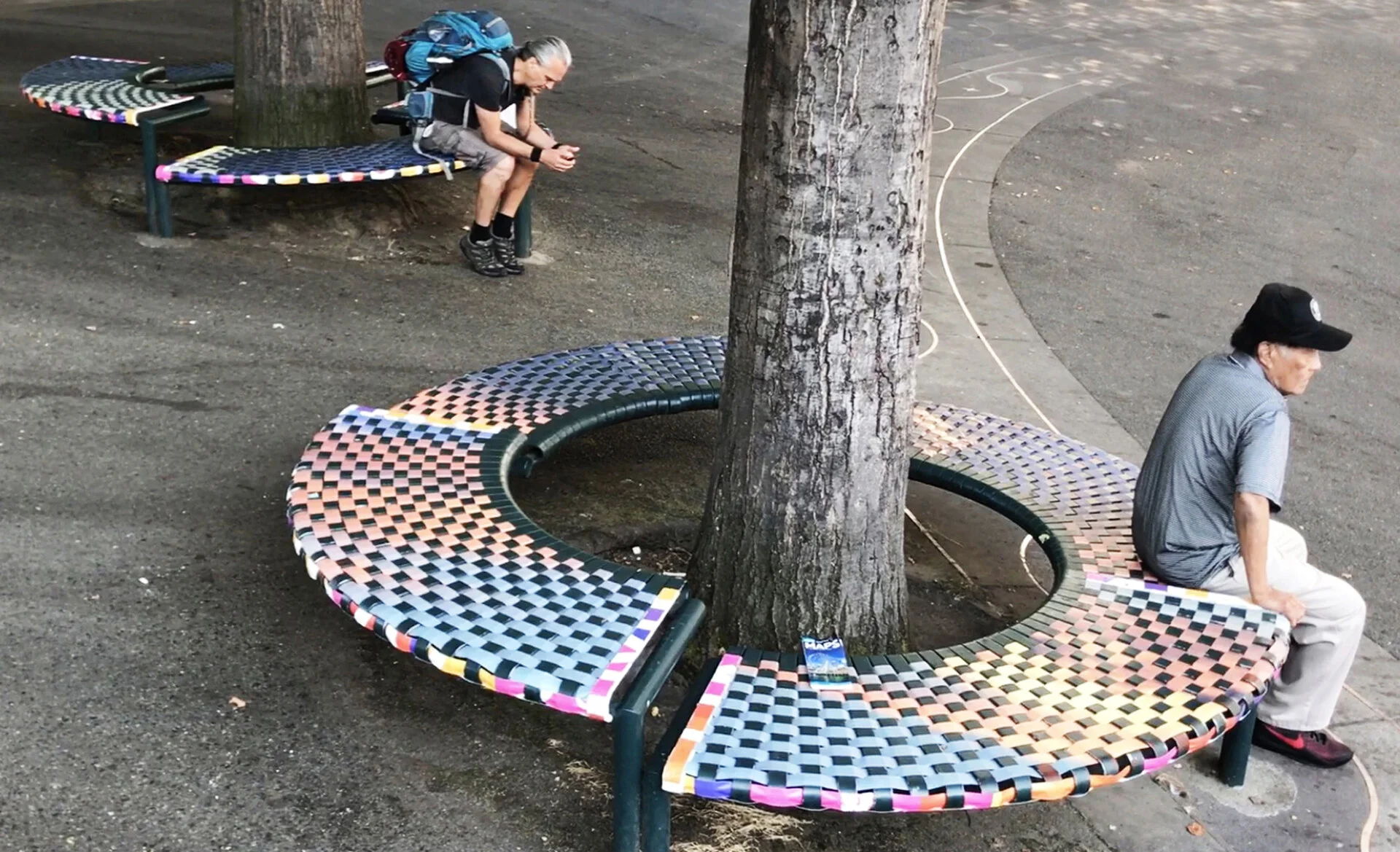   Sitting Pretty , 2017. Recycled vinyl from promotional banners. 28 x 79 inches (11 panels) 