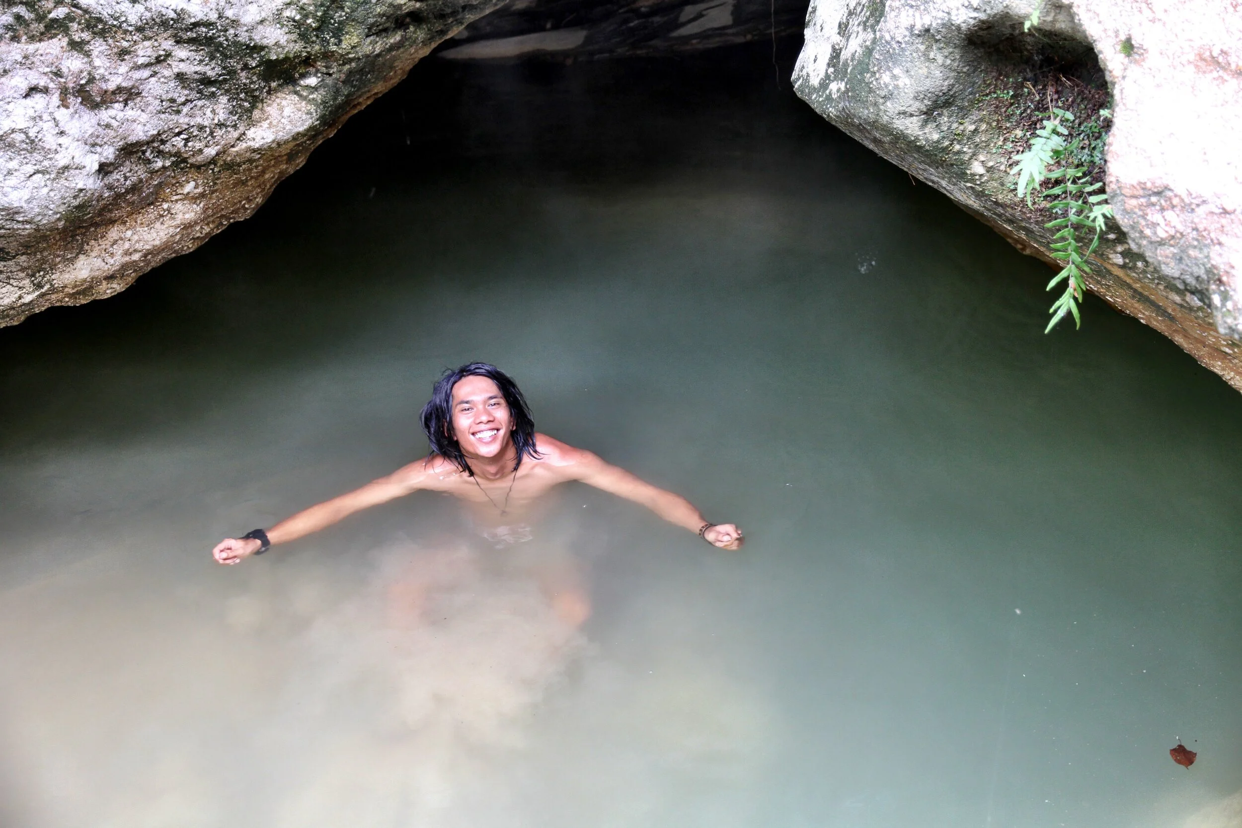 Rajaa enjoying a naturally warm hot spring fed pool.