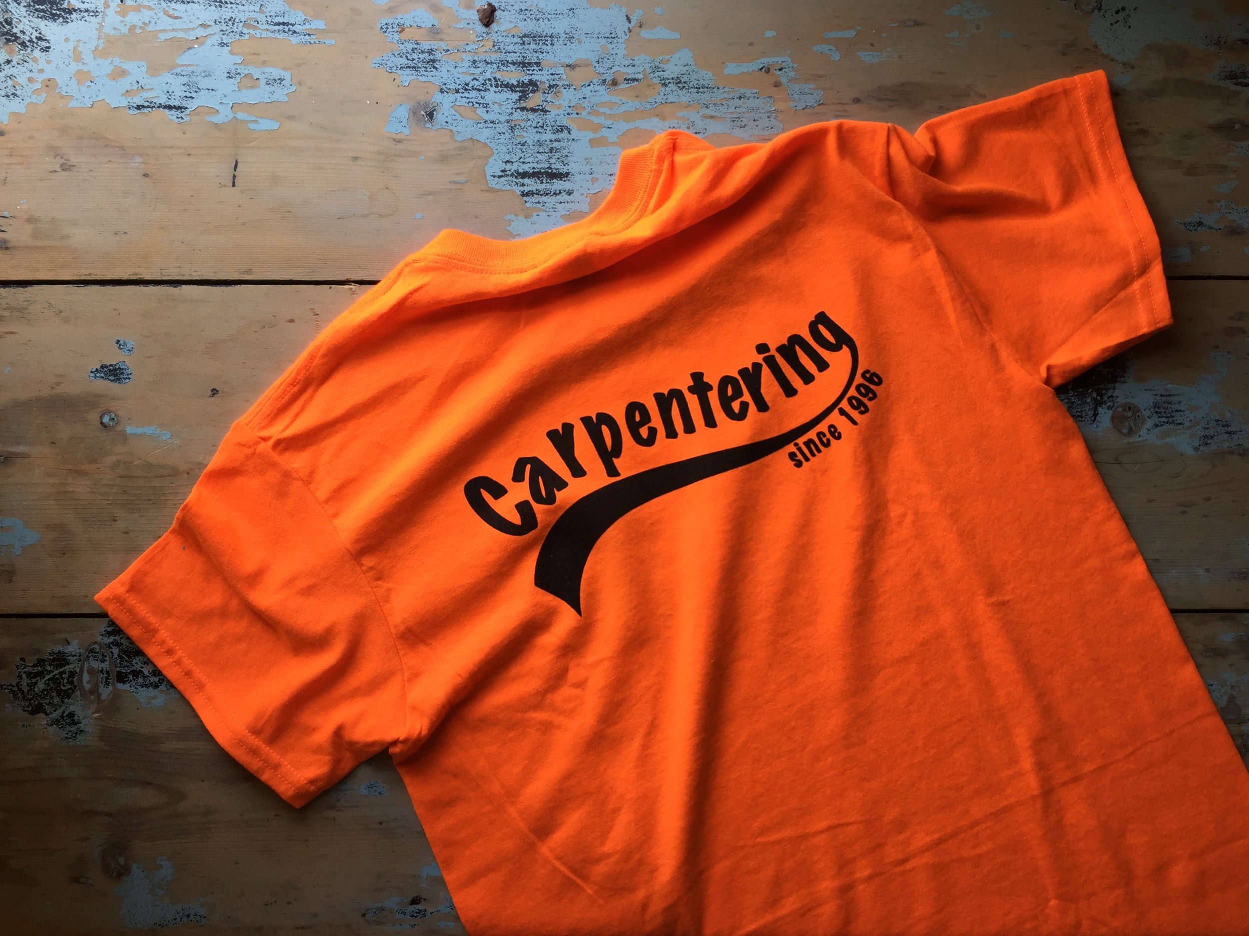 Safety Orange t-shirt with black print on back