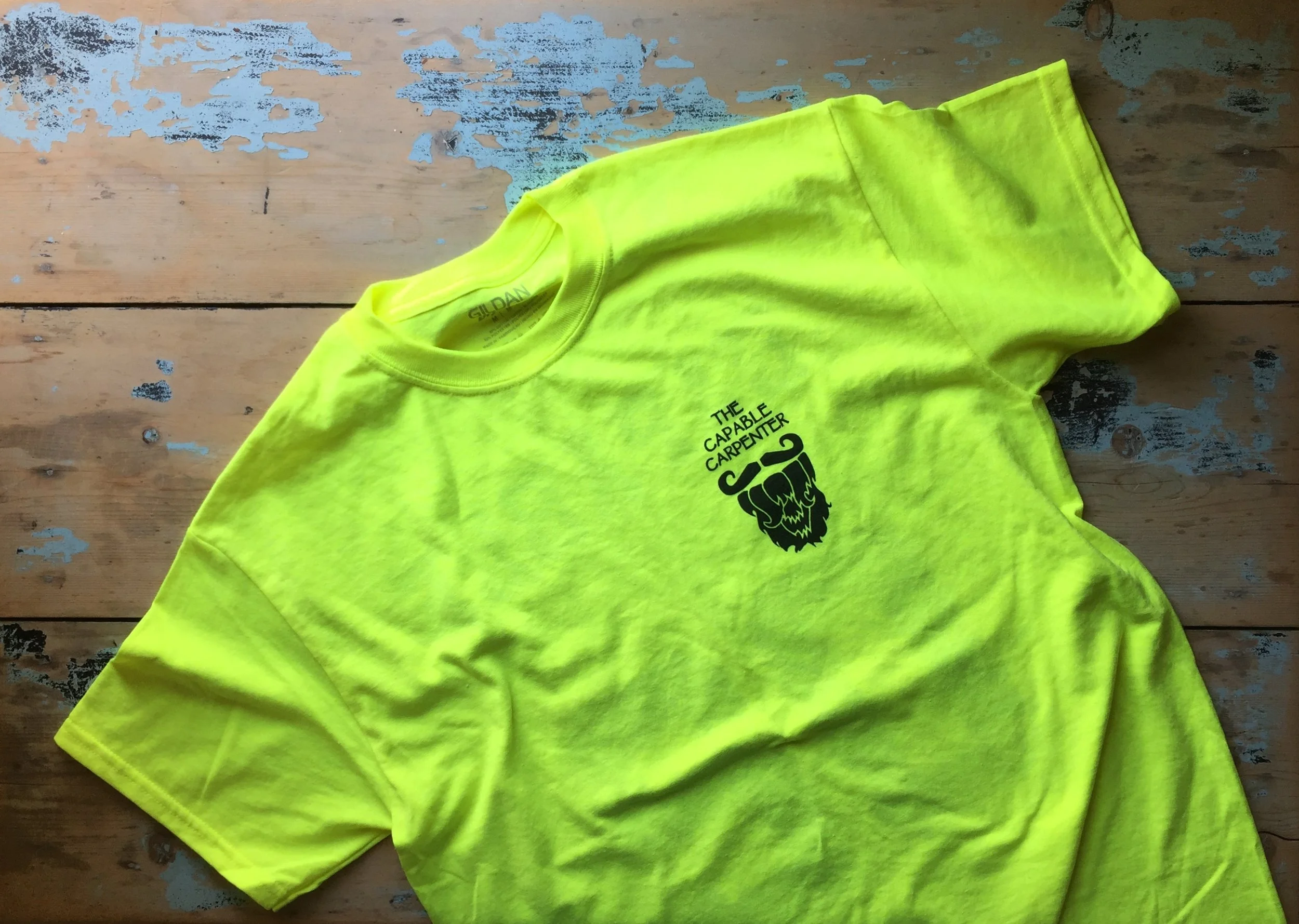 Safety Green “yellow” t-shirt with black logo print on front