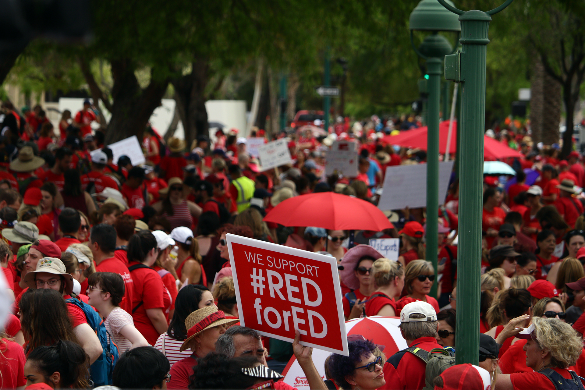 Supporters for #RedforEd holding protests on April 27th, 2018. (Jackie Hai/KJZZ)