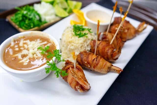 Camarones Costa Azul, our customers' all time favorite. Bacon wrapped shrimp stuffed with monterey jack cheese. Once you have one you can&rsquo;t stop. Comes with a side of rice and beans. Also available on UberEats, GrubHub, Postmates, DoorDash, and