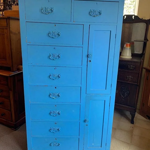 Exceptional oak tall boy dresser from our local Stratford Masonic Hall. This cabinet has a narrow 36” case while standing 6’3” tall, making it a very rare and desirable size. Solid oak with all of its original brass hardware. The dr