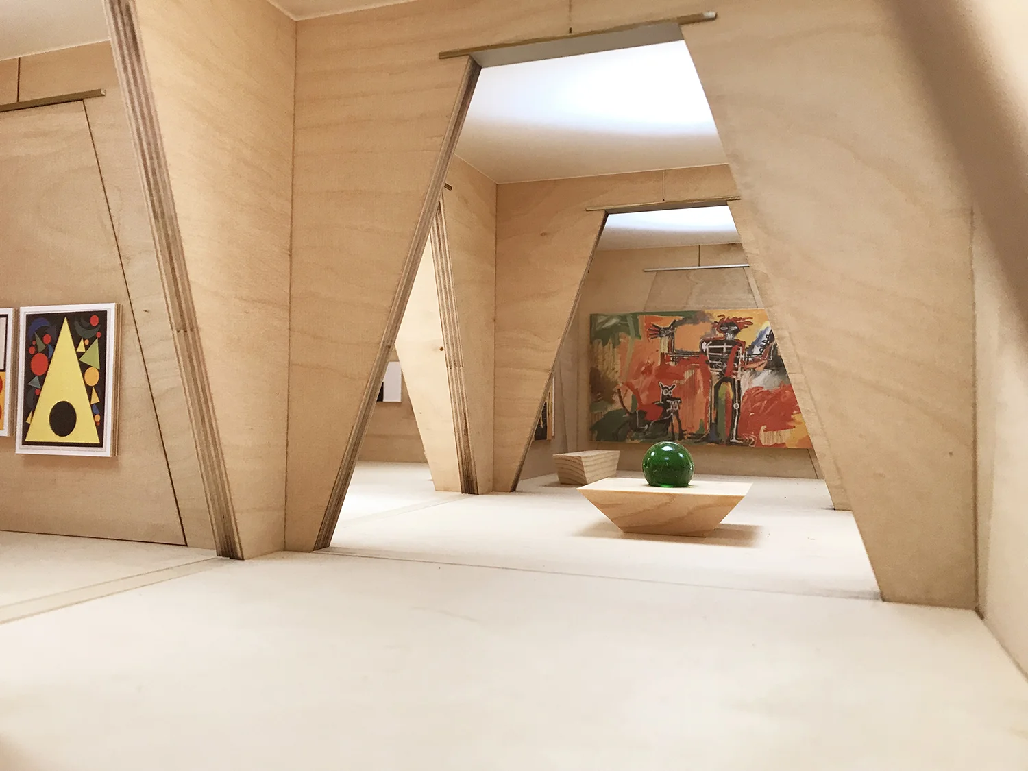Zenith lighting and a light diffusing canvas would allow for even natural light diffusion and control