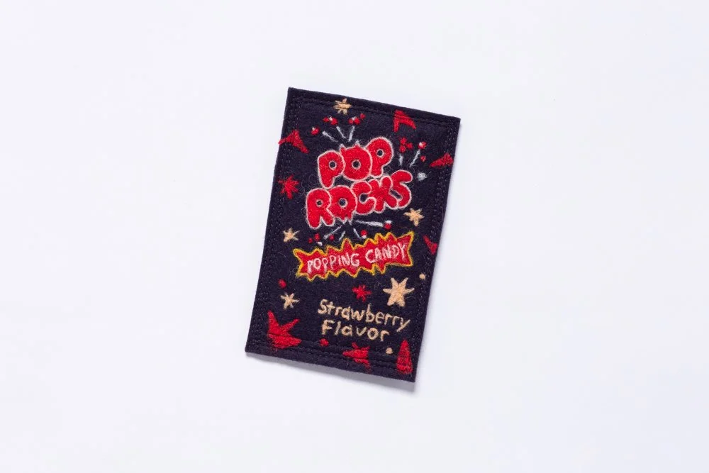   Pop Rocks,  2023 Needle felting and stitching on wool felt. 5.5 × 3.5 x .5 inches  