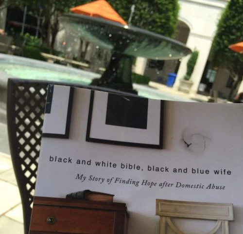 "Black and White Bible, Black and Blue Wife"