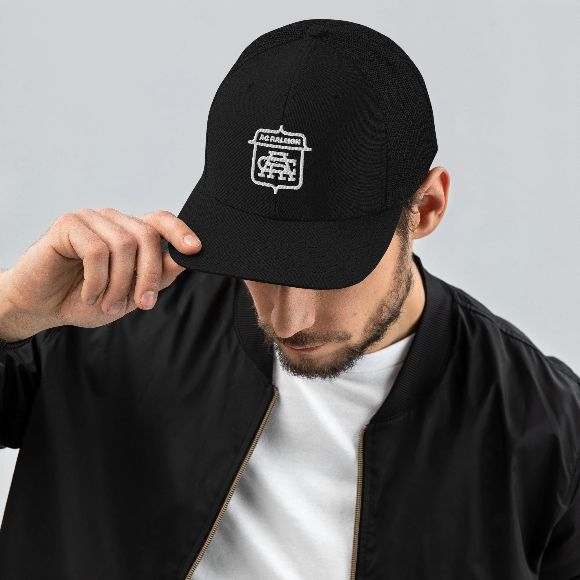 snapback-trucker-cap-black-front-69385eff0ad54.jpg
