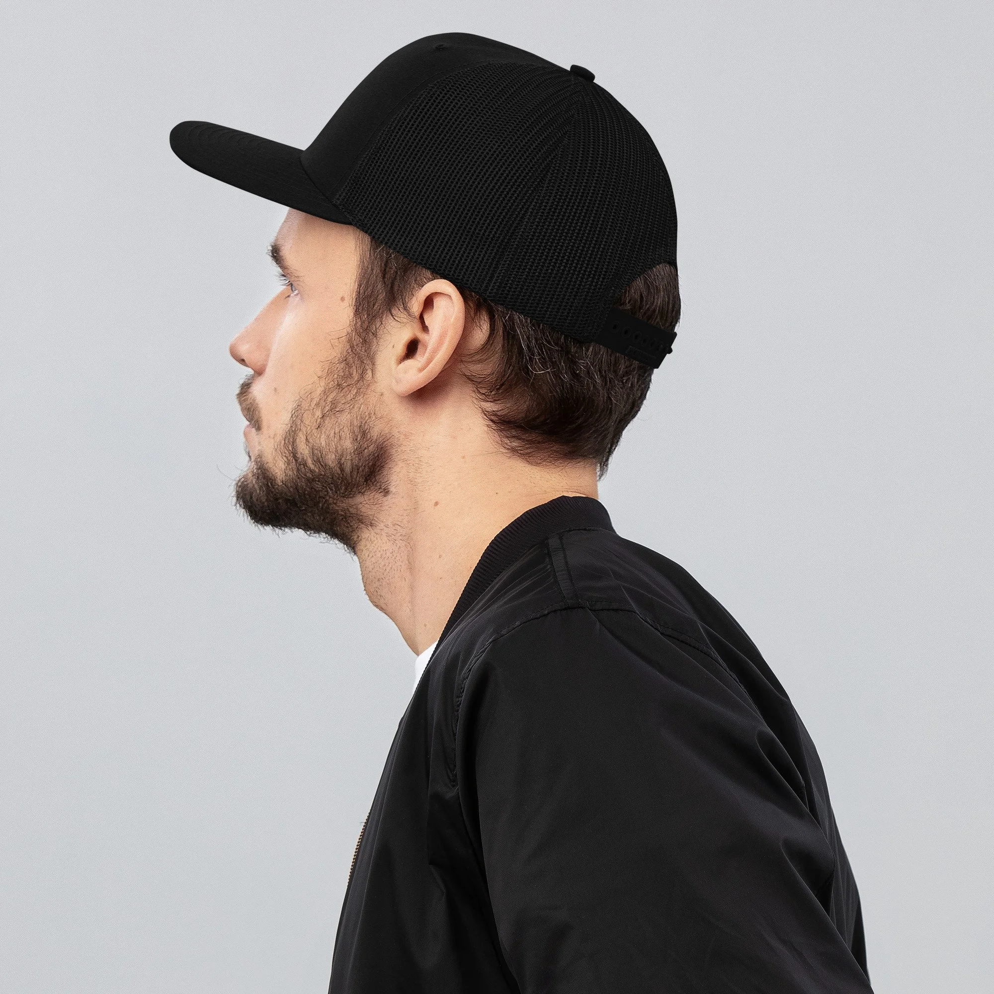 snapback-trucker-cap-black-left-side-69385eff0c74f.jpg