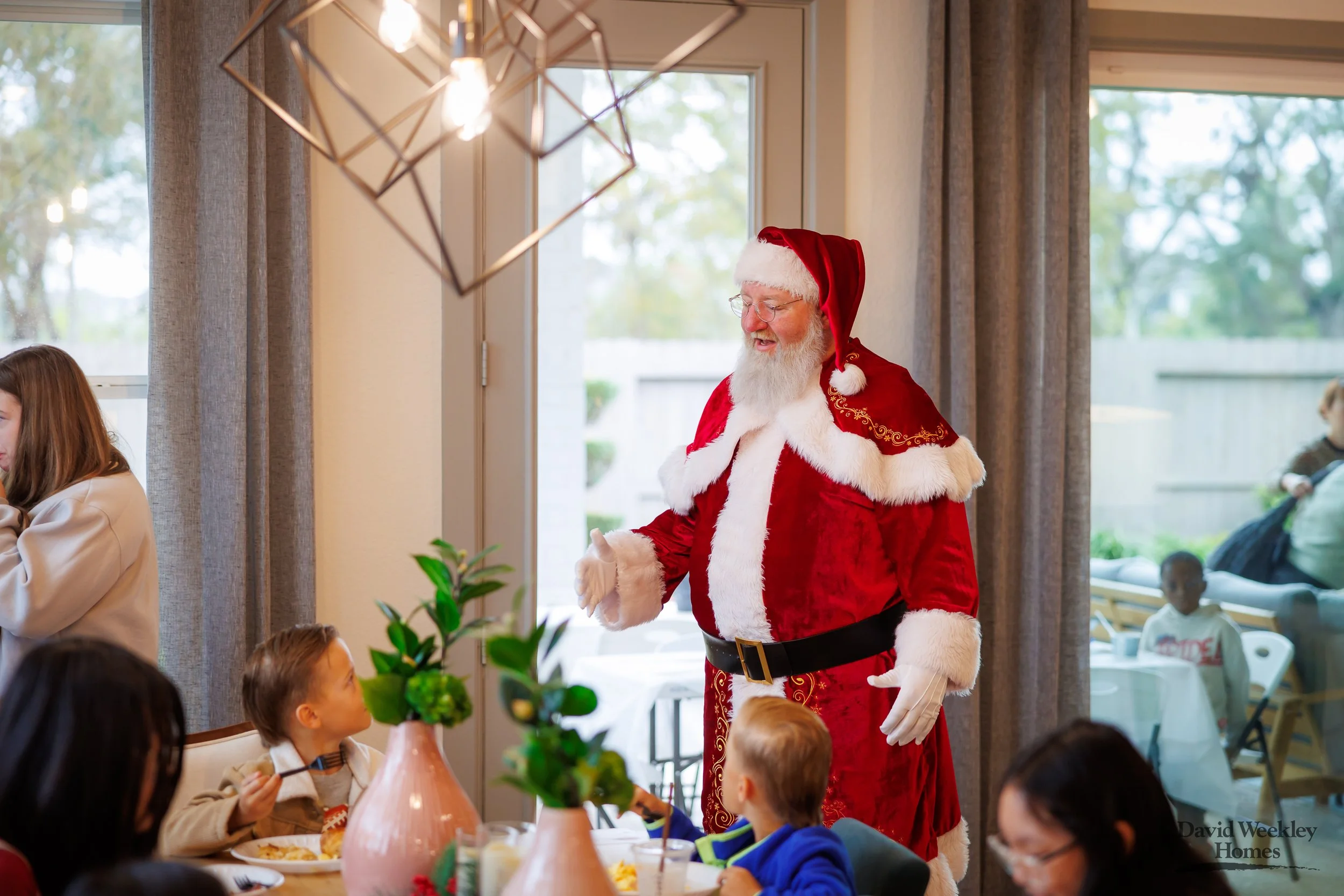 SPP-L-W-12.08.2024-David Weekley Homes Photos With Santa Sienna 65-24.jpg