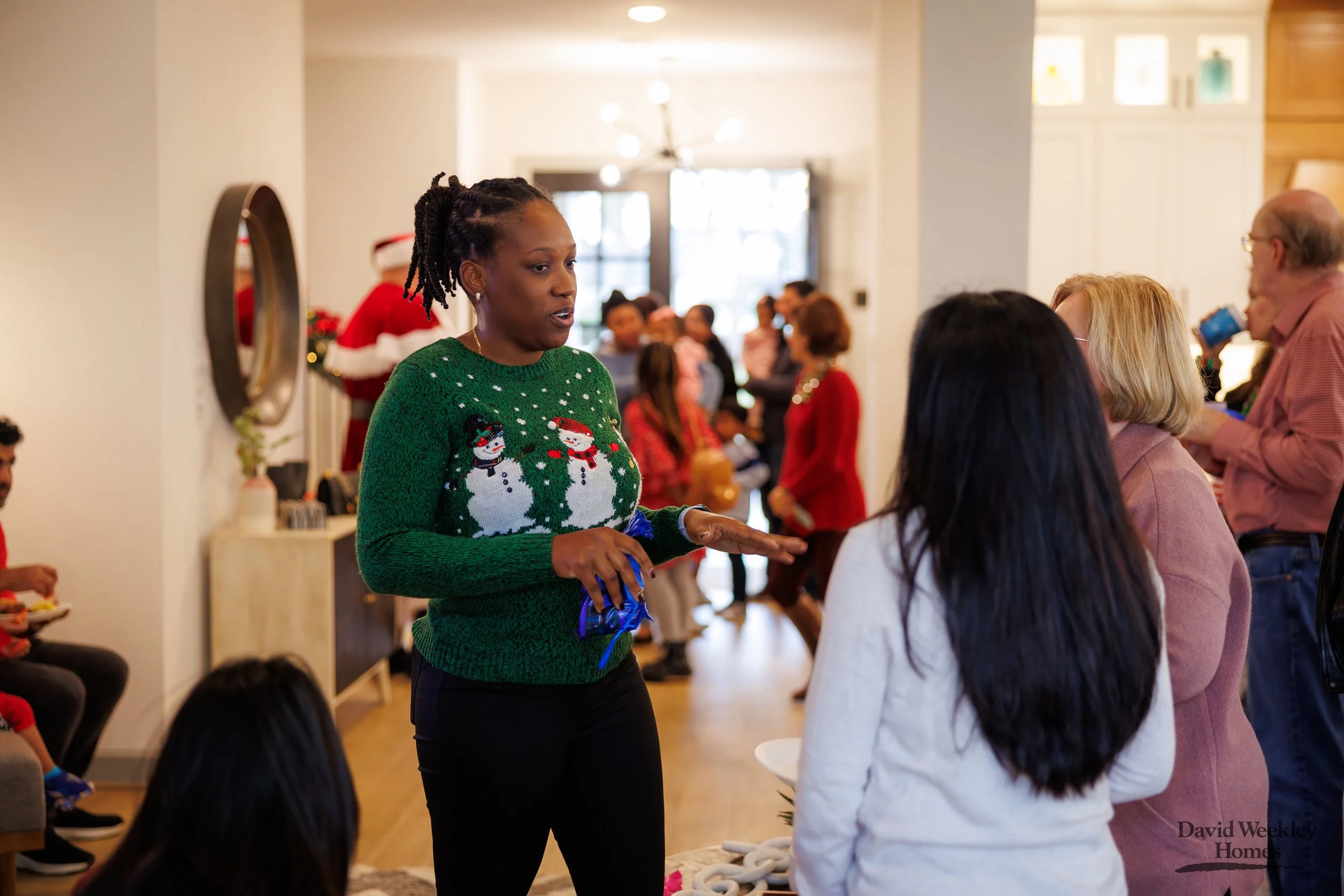 SPP-L-W-12.08.2024-David Weekley Homes Photos With Santa Sienna 65-110.jpg